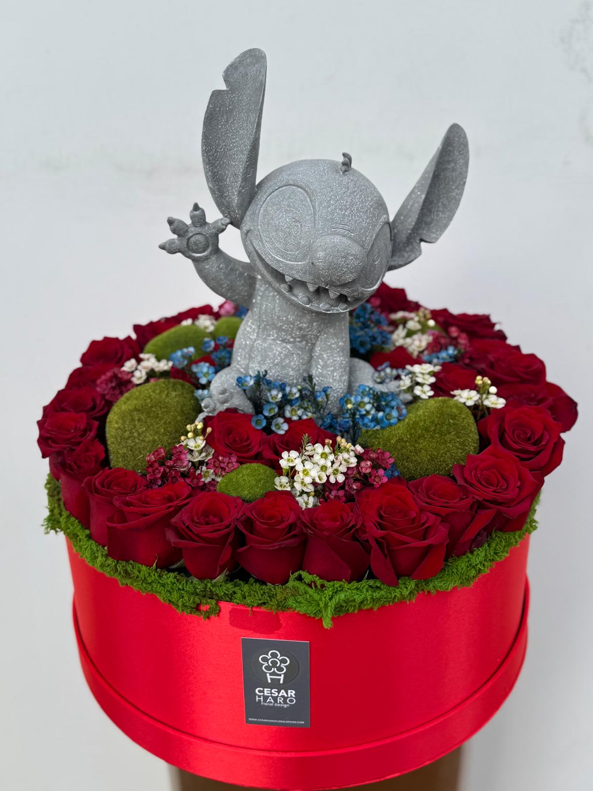 Stitch Love  - Peeking above the 20in red rose garden, Stitch searches the garden for his Ohana. 