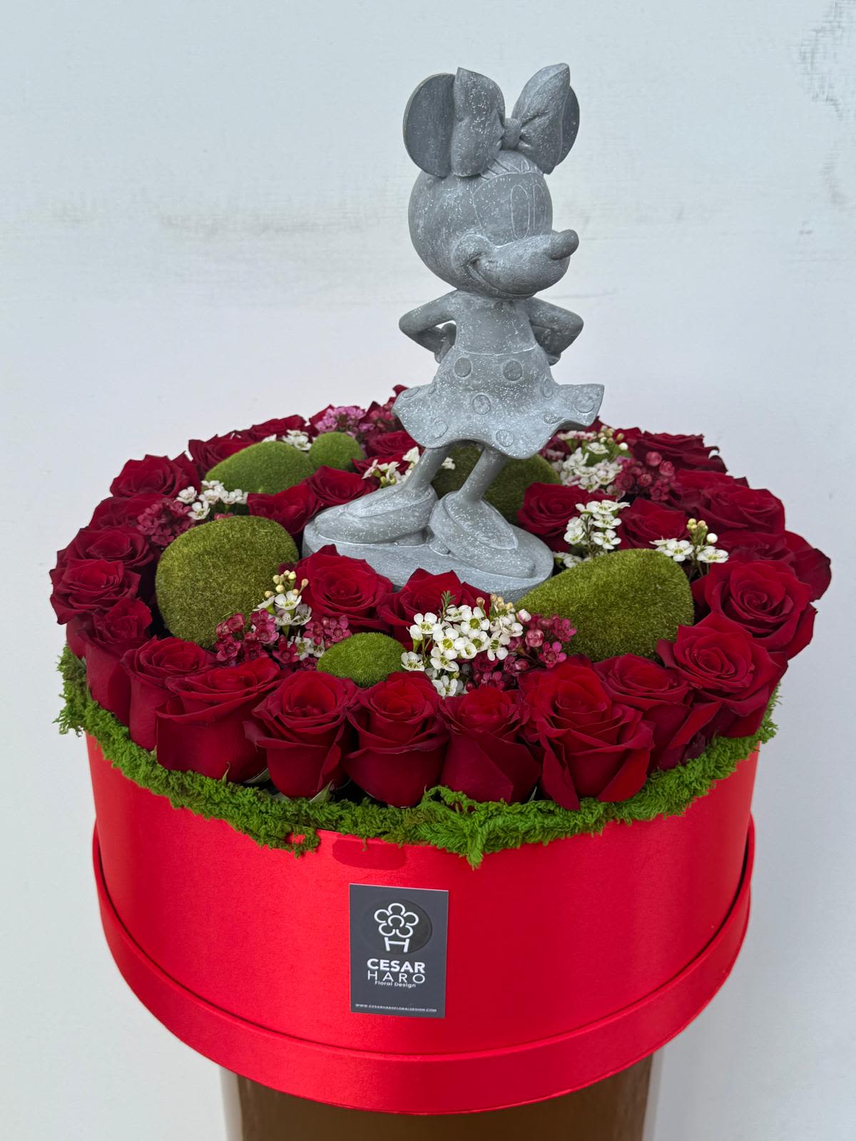Minnie Mouse Love Garden  - The greatest gift of all is love lost somewhere between roses, fairytales, and a little Disney Magic. 20in garden available in Minnie or Mickey 