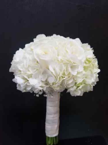 White hydrangea bouquet with a wrapped handle
