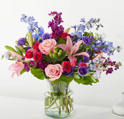 BREEZY MEADOW - Bursting with exquisite colors and voluminous texture, the Breezy Meadows Bouquet brings the beauty of nature indoors, leaving your recipient feeling grounded and loved.