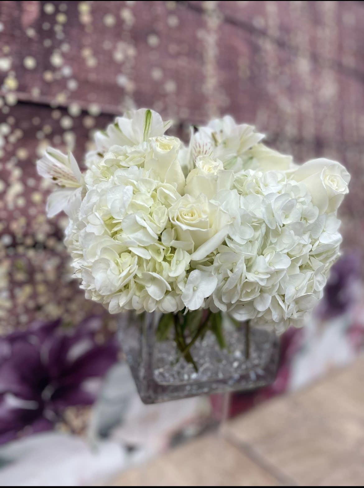 White as snow - A modern square with crystals and Premium white hydrangea, white roses and white alstroemeria. Perfect for any person on any occasion