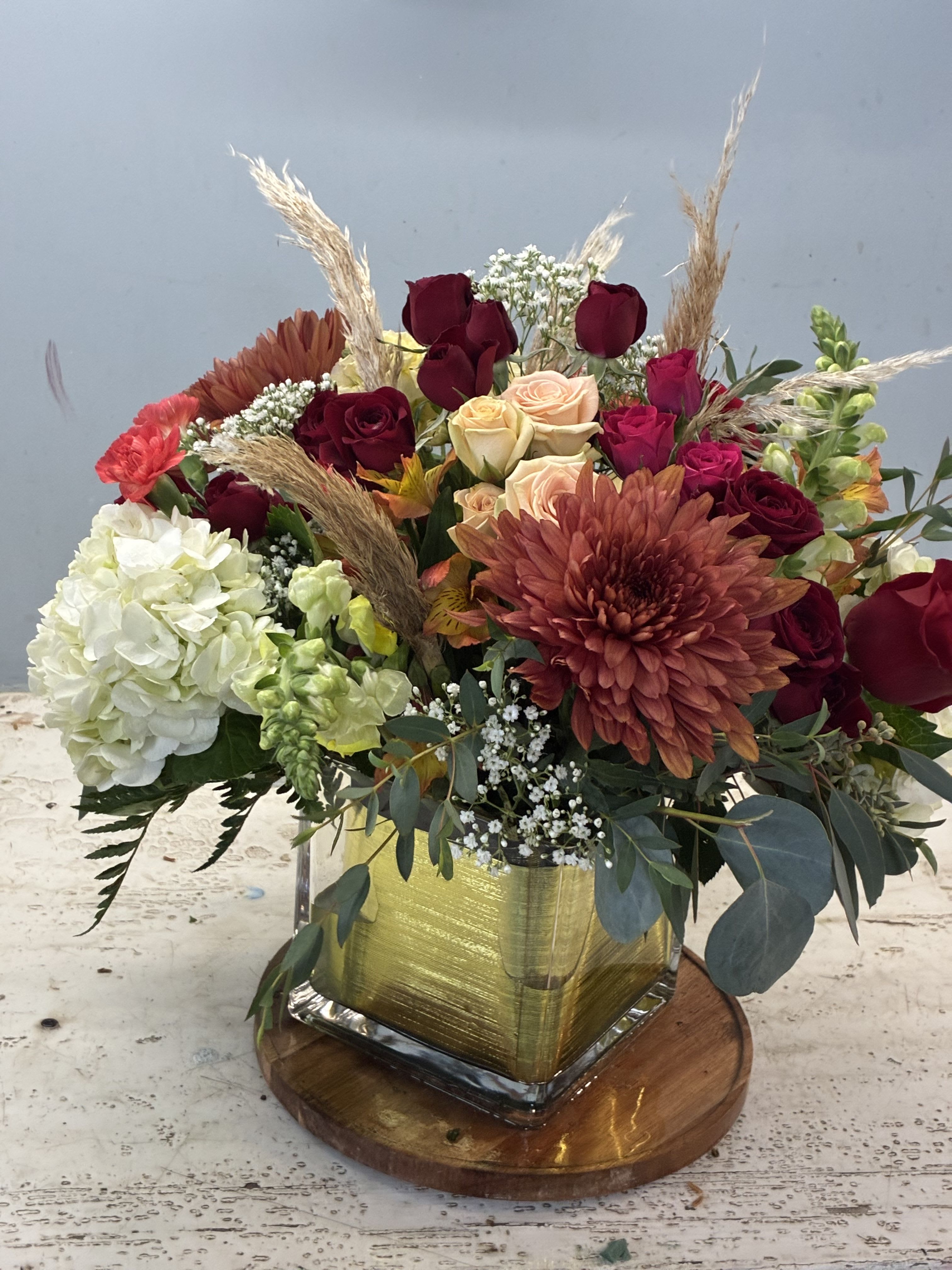 Fall festive - Our best selling arrangement full with lush fall color blooms. 