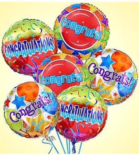 Cluster of colorful congratulatory balloons with star patterns