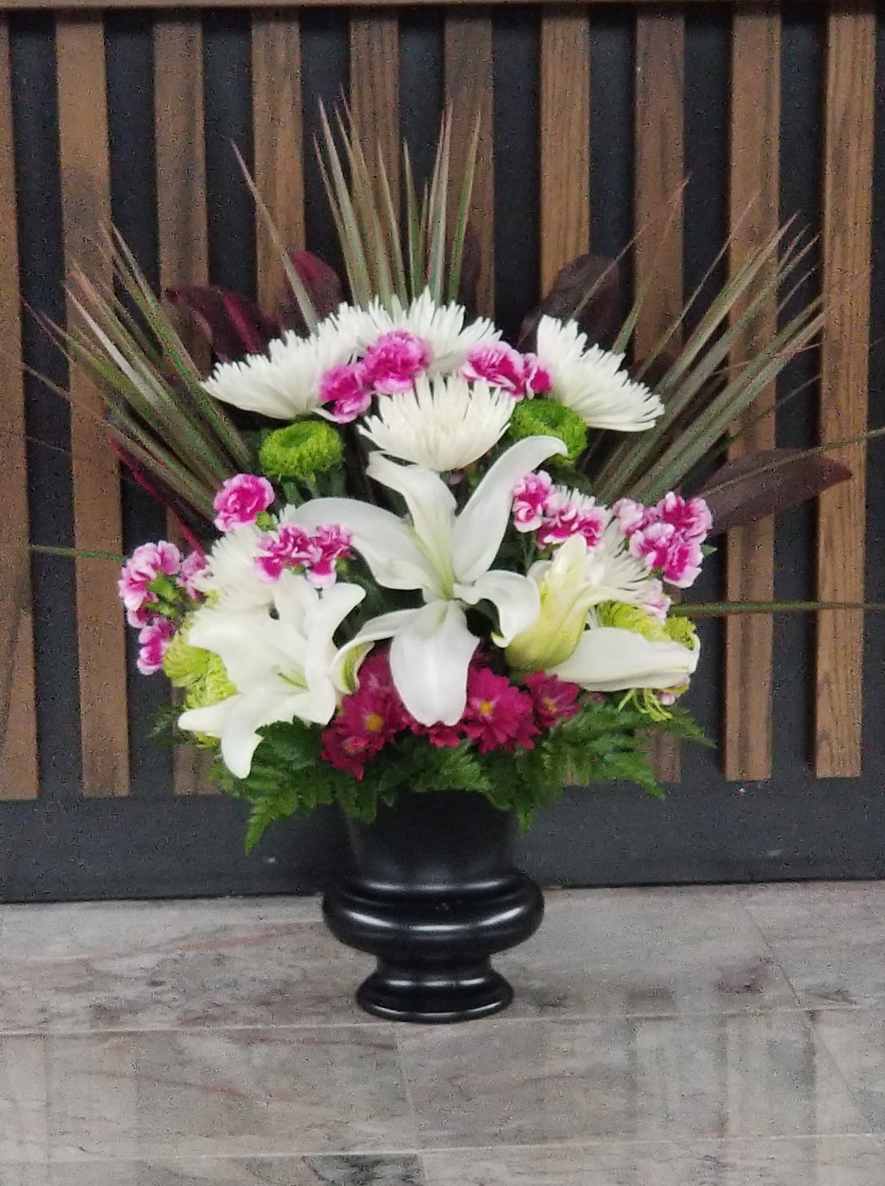 Graceful Glory by Petals 2 Go - An exuberant celebration in this glorious bouquet of lilies, carnations and greenery and hydrangeas , adds feminine grace to this arrangement.