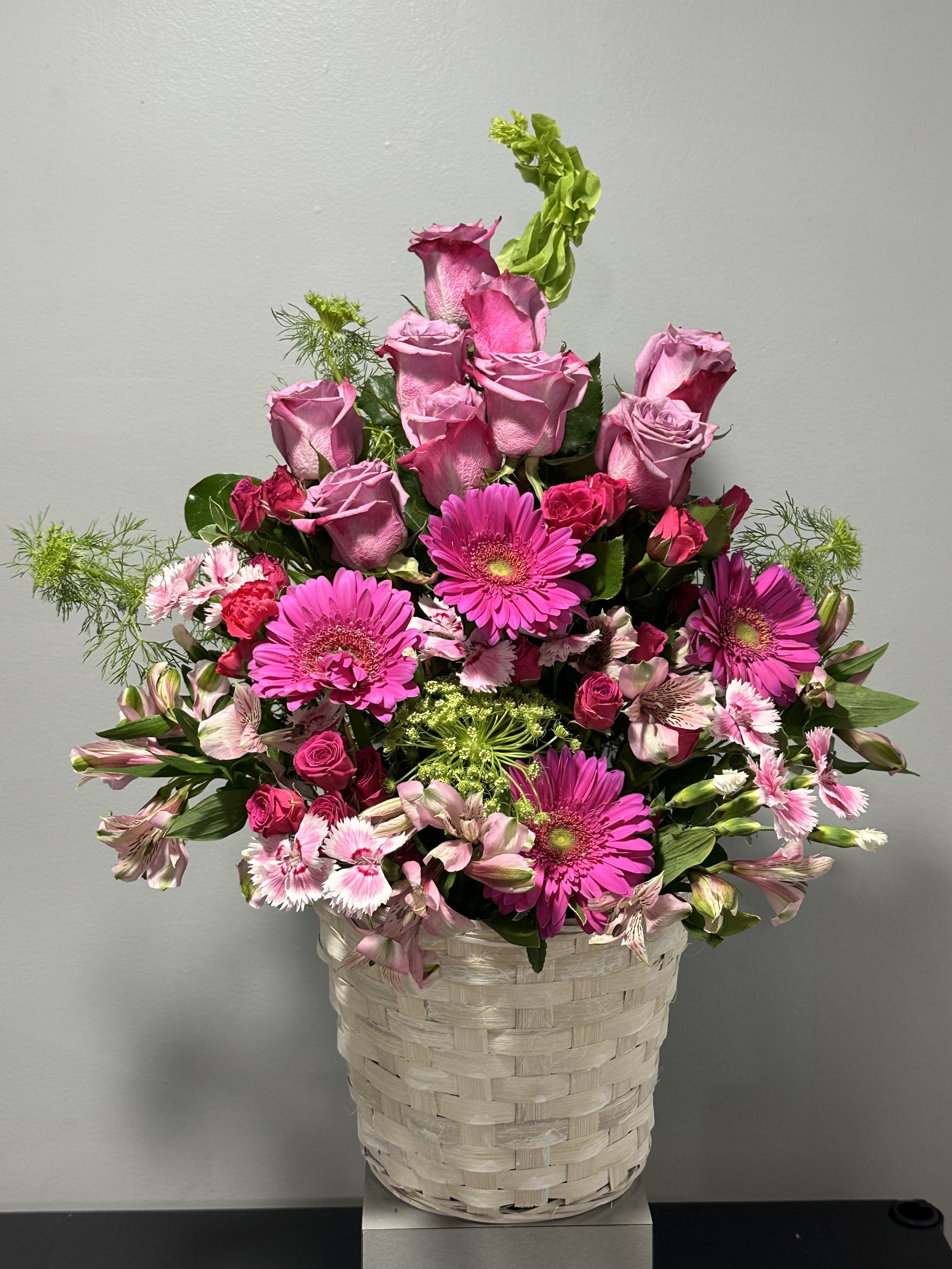 Serene Basket by Petals 2 Go - Soothing compassion pinks are combined beautifully in this basket overflowing with pretty flowers. Show your thoughts and pay tribute to someone special