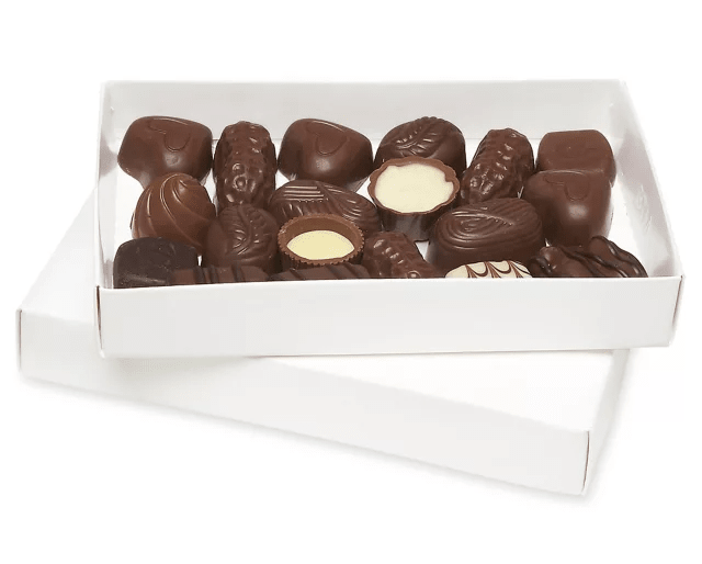 Box of assorted chocolates in a white tray