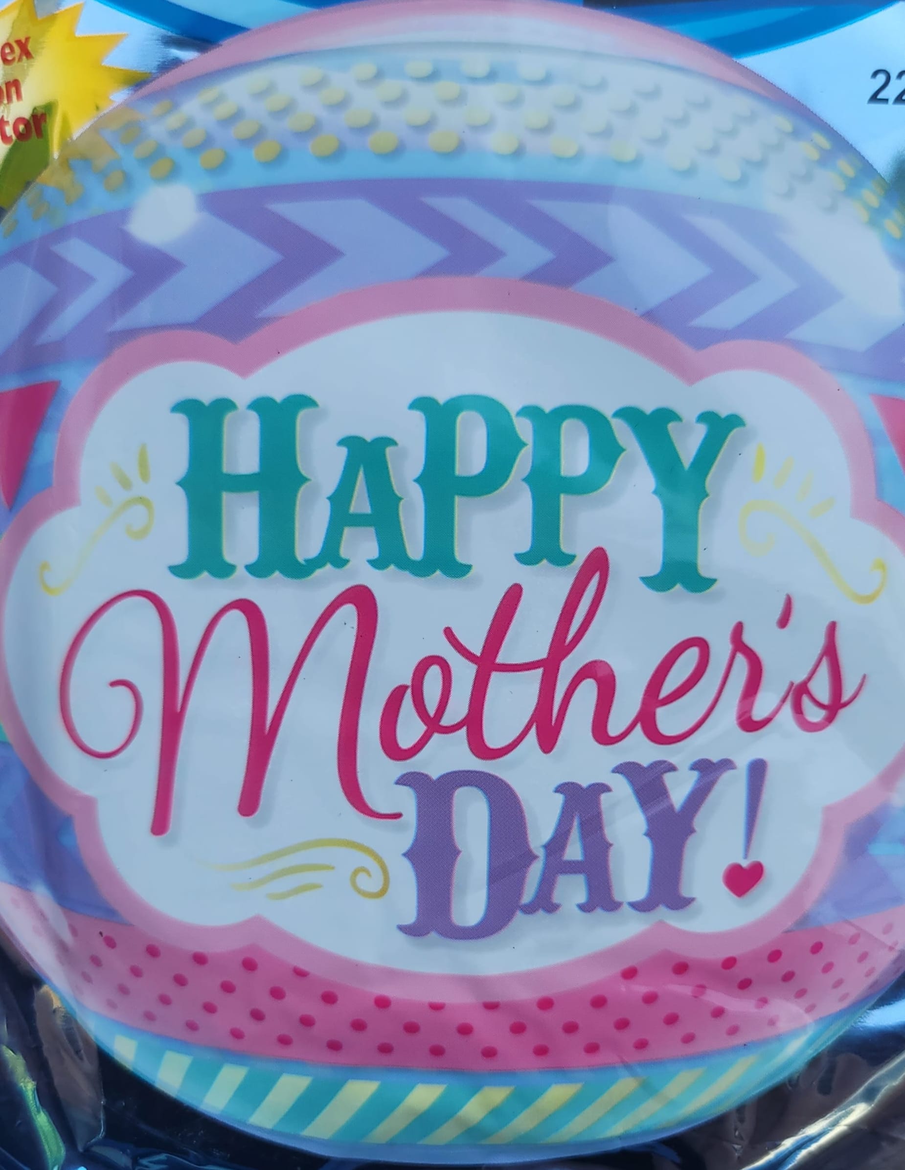 Round balloon with "Happy Mother's Day" text in pink, teal, and purple