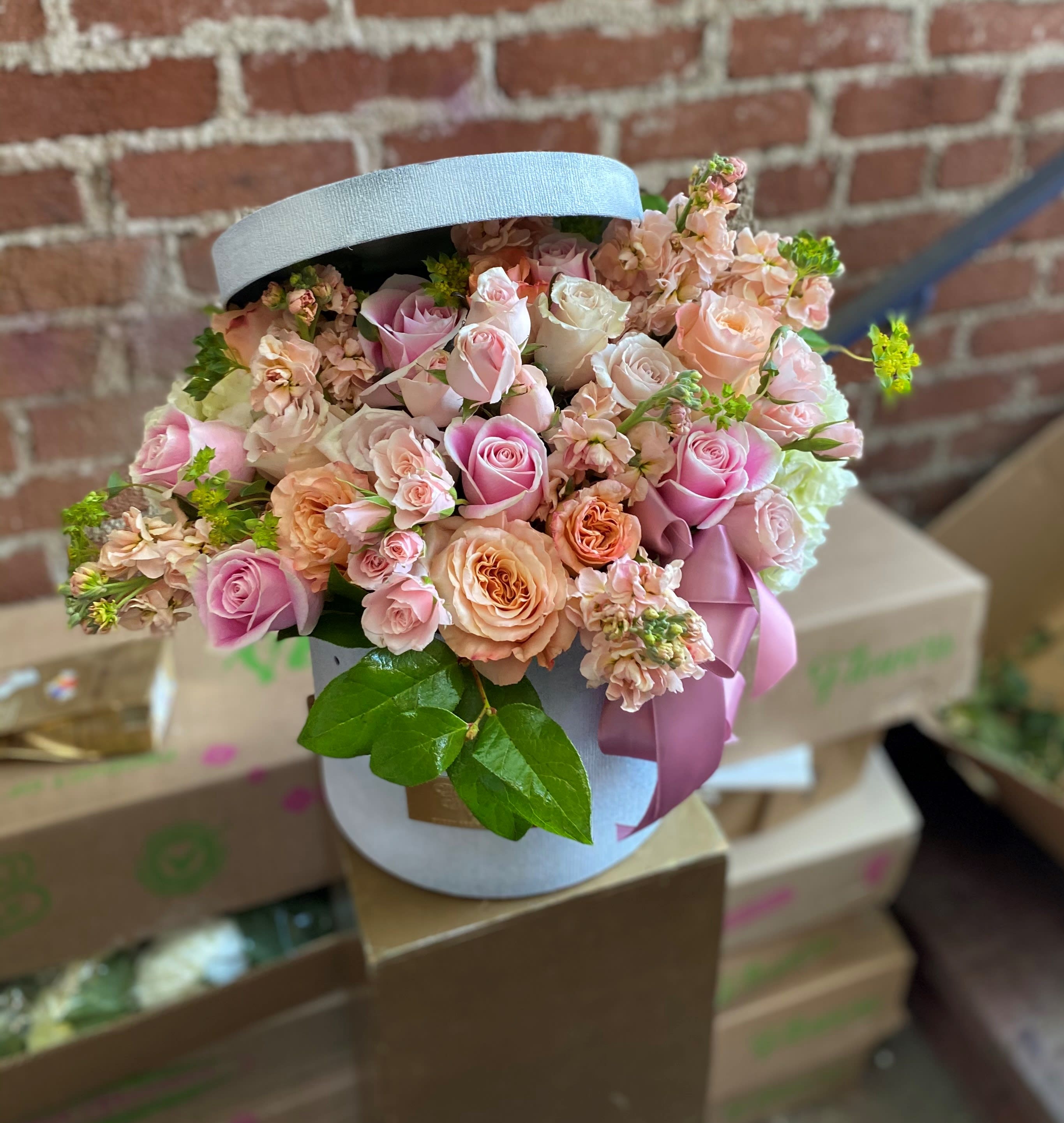 Irene - Sylmar Florist - This beautiful arrangement is designed to deliver happiness to a loved ones day. Filled with beautiful flowers and customized to perfection, this arrangement is a showstopper! If you want to turn heads then this is the arrangement for you! 