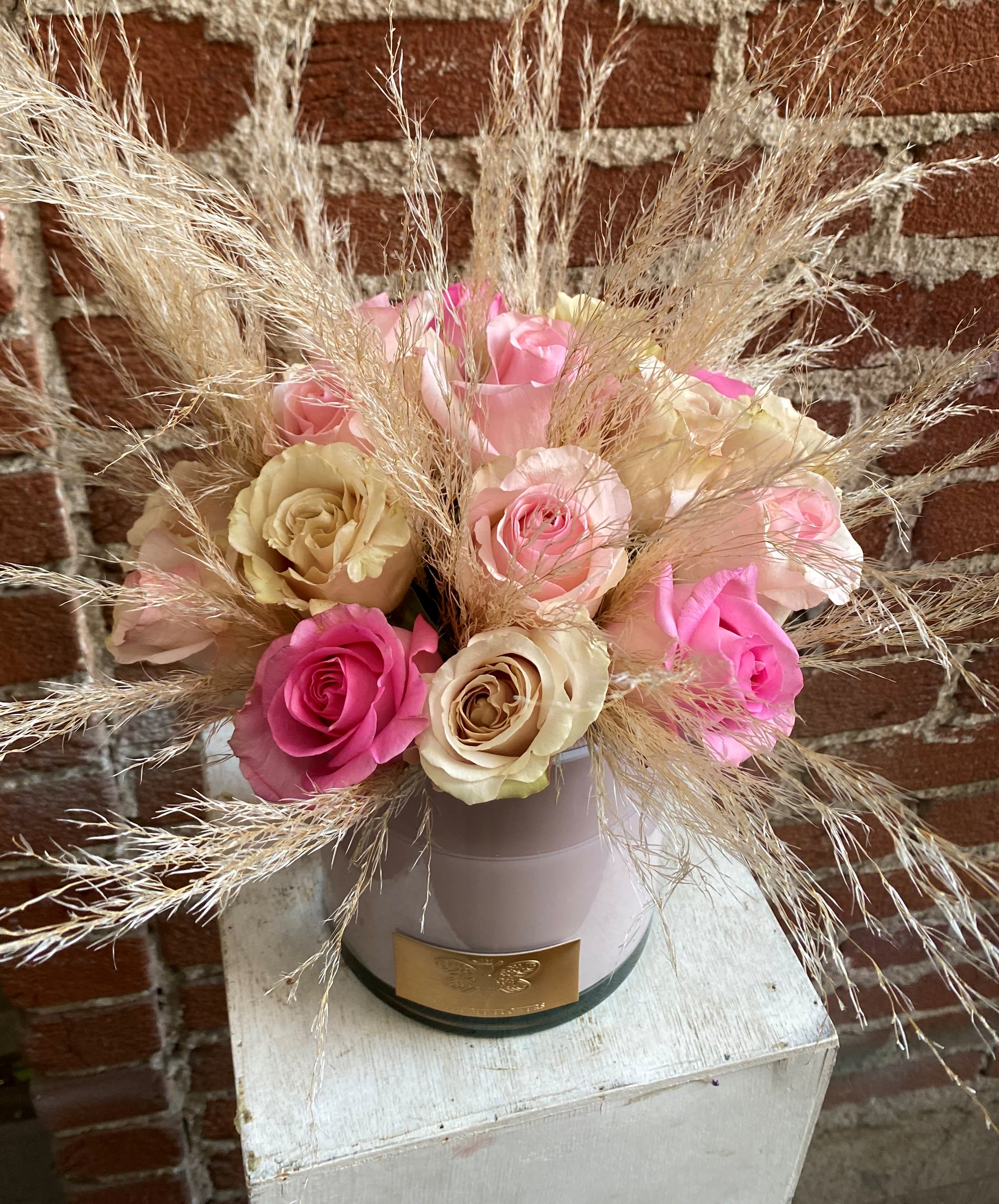 Chic- Sylmar Florist - This beautiful arrangement is designed to deliver happiness to a loved ones day. Filled with beautiful flowers and customized to perfection, this arrangement is a showstopper! If you want to turn heads then this is the arrangement for you! 