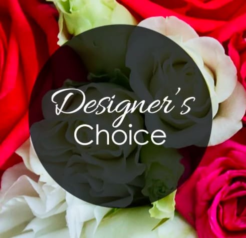 Red and white roses with a "Designer’s Choice" label