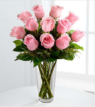 The Long Stem Pink Rose Bouquet by FTD® - Picture-perfect soft pink roses make a beautiful gift for the lovely lady in your life. Wife, mother, daughter or sweetheart, she's sure to cherish this bouquet of pastel pink roses accented with seeded eucalyptus and arranged in a clear glass vase.  GOOD rose bouquet is approximately 18"H x 12"W, Your purchase includes a complimentary personalized gift message.