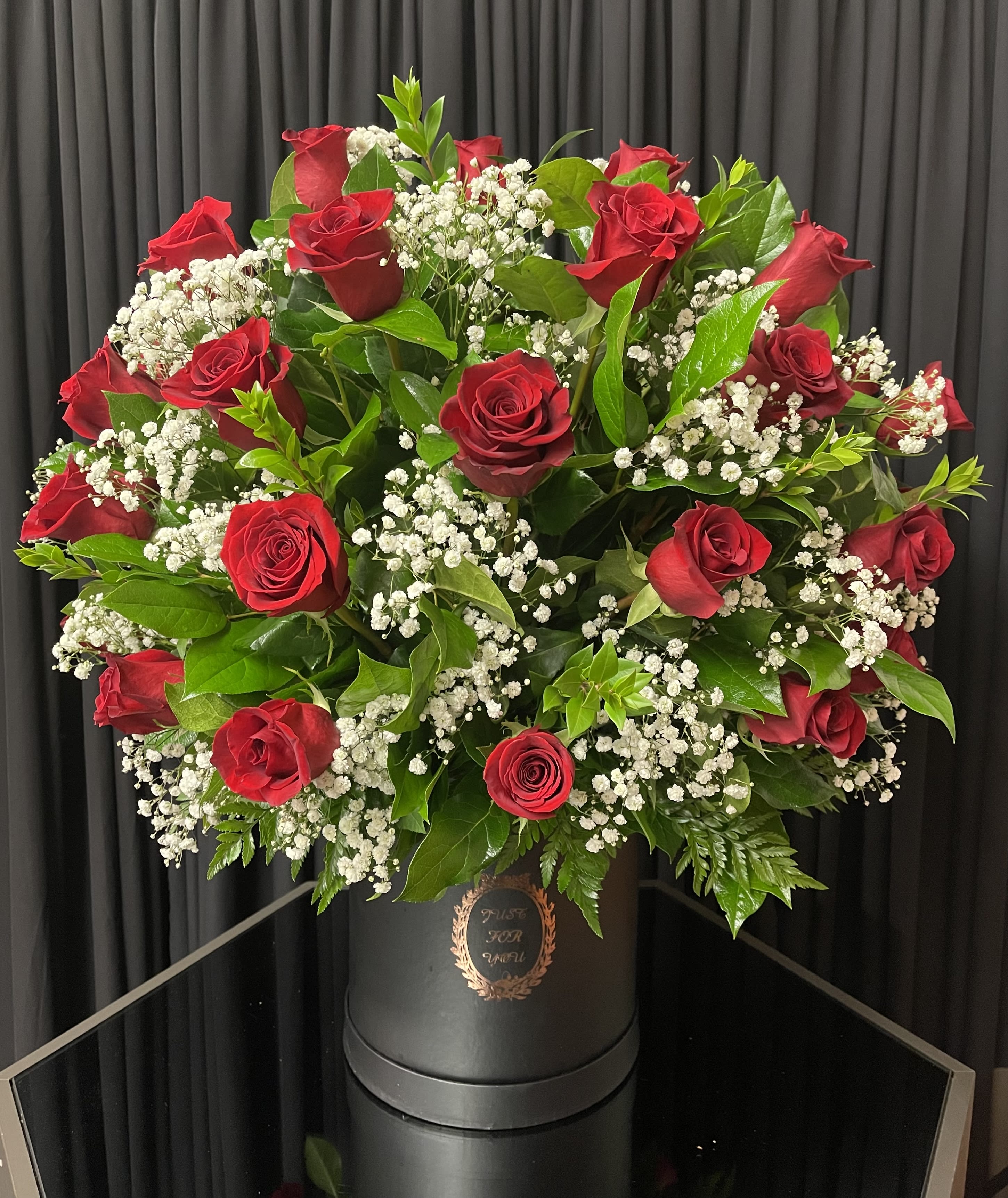 Red rose top hat  - 30 red rose arrangement. Can be requested in different color roses or in a mix arrangement.