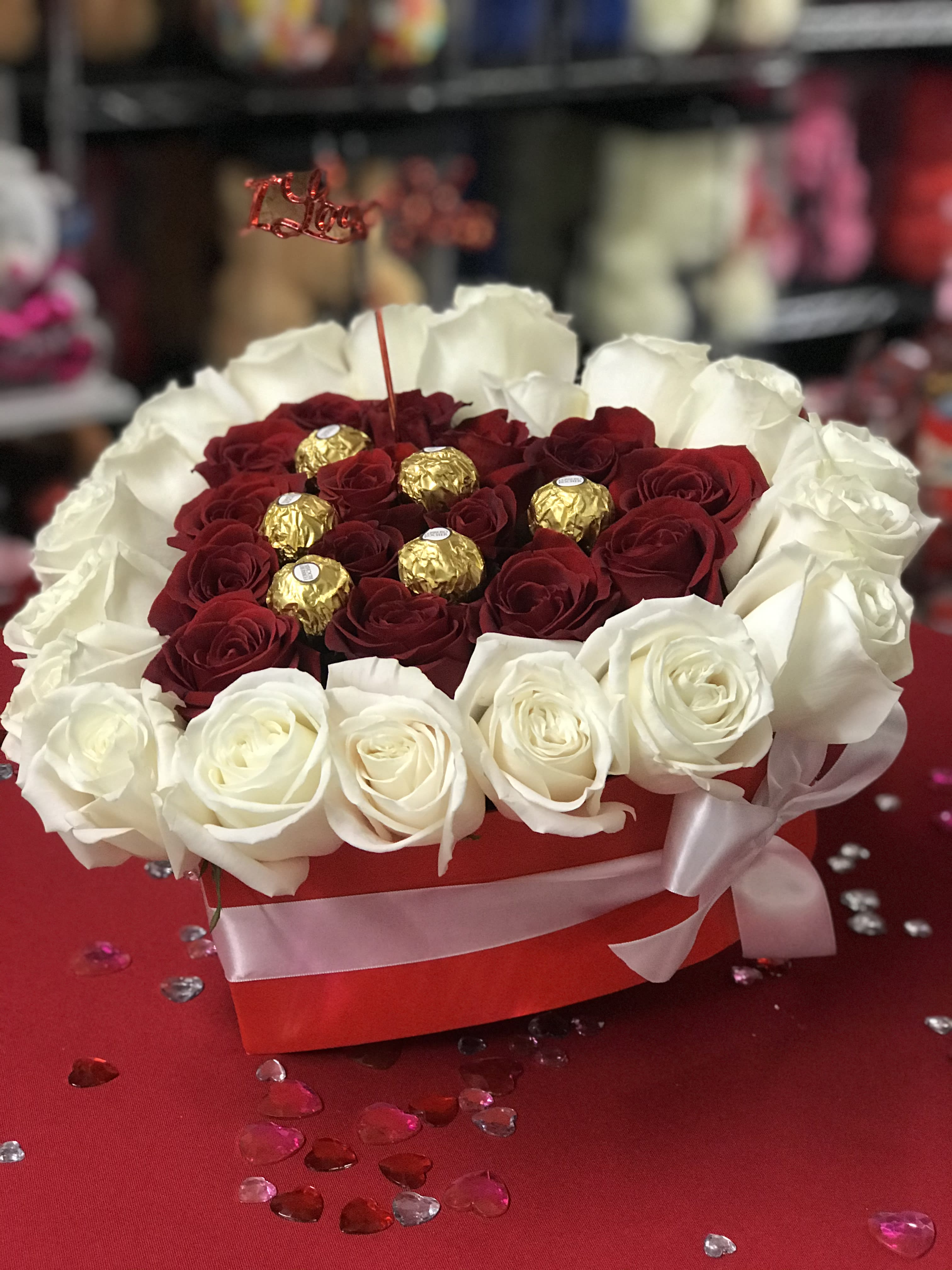 Red and white Heart box - This heart box contains about 35 red and white roses. Perfect for valentines day or just want to shoe your love to a special someone.