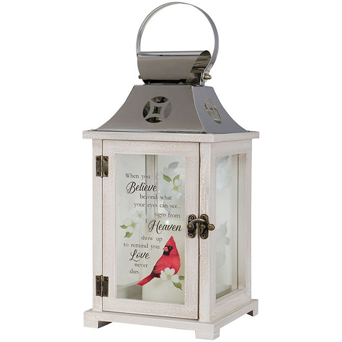 Decorative white lantern with a cardinal and memorial quote