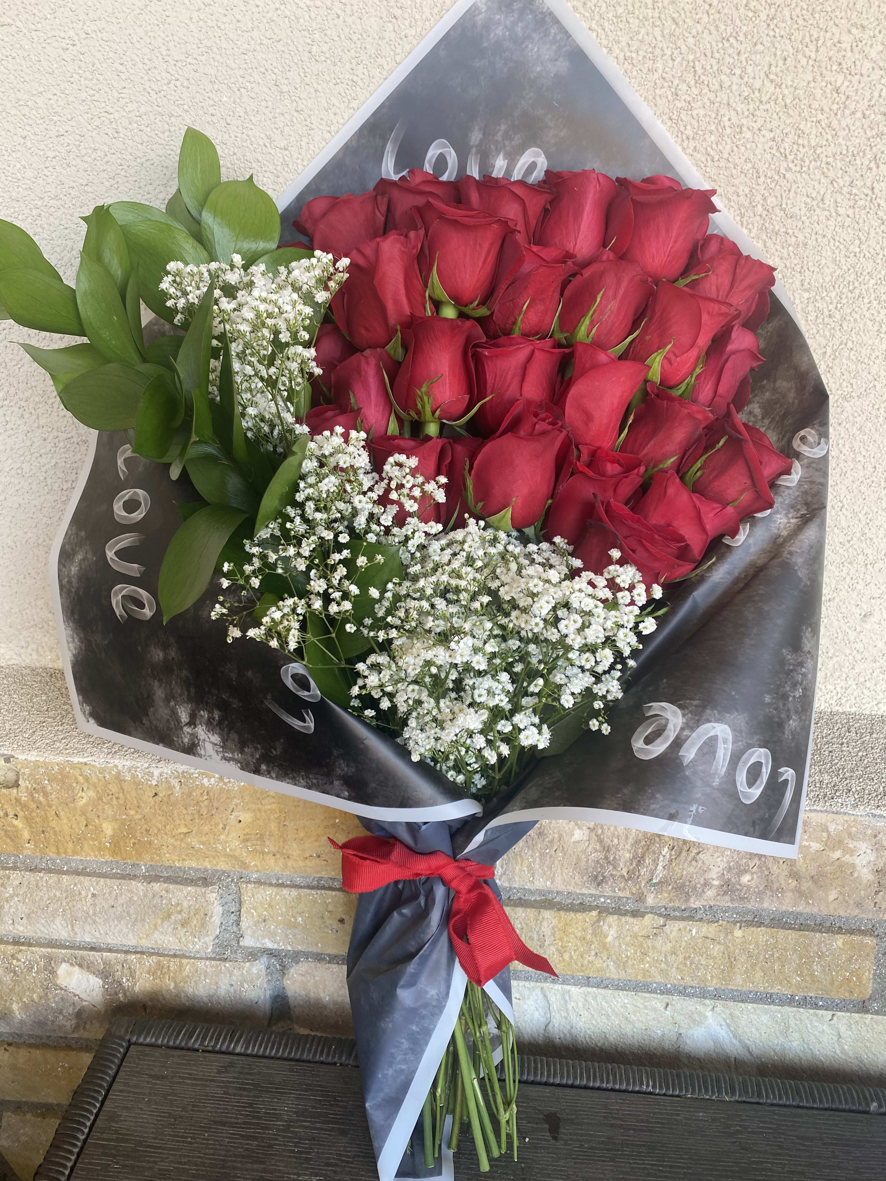Extra Love - Roses, babies breath and greens.