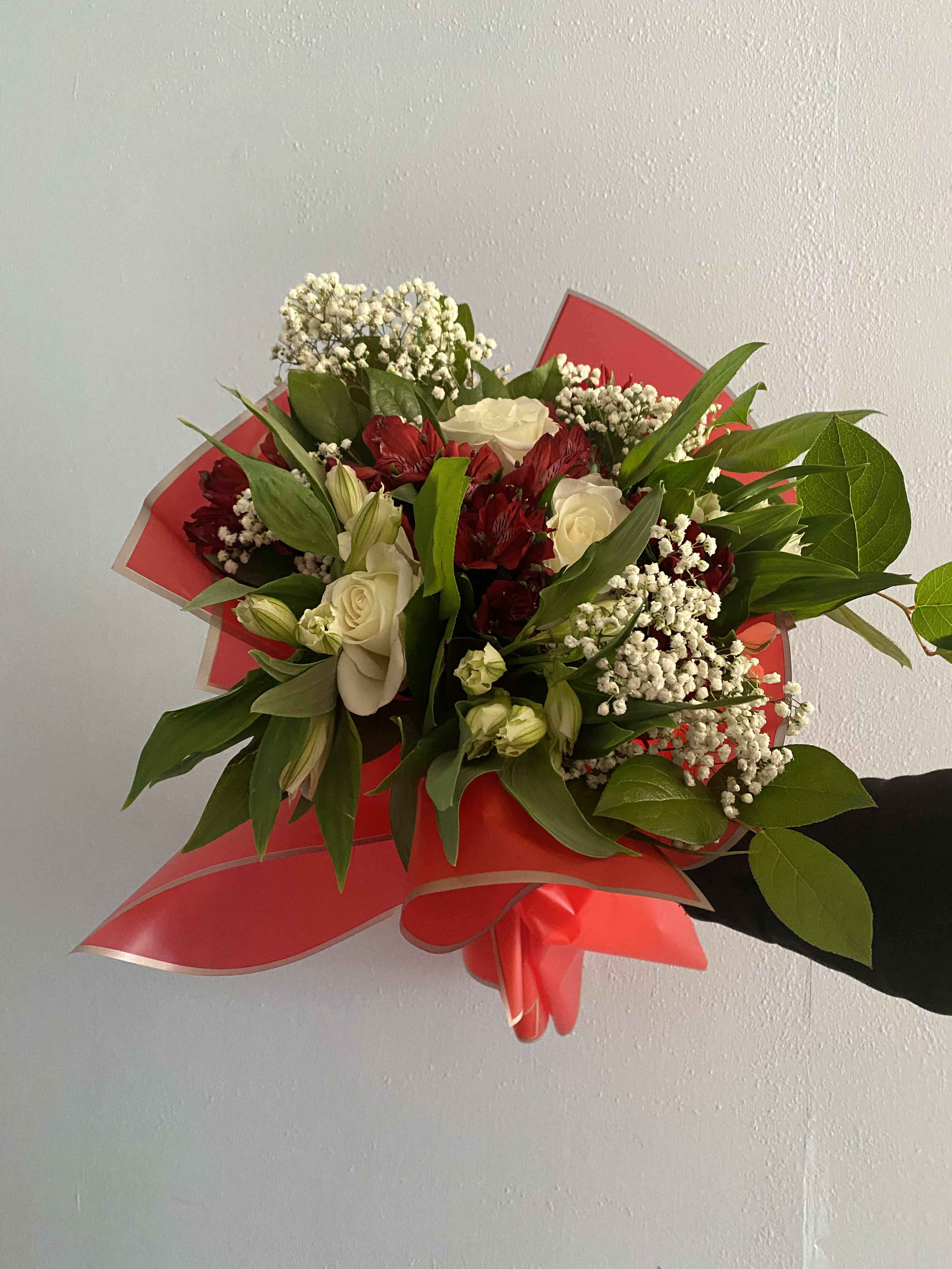 Hand arrangement of mixed flowers in your choice of color - Hand wrapped arrangement of mixed flowers. Pick your colors and if one is not picked then it will be florist choice 