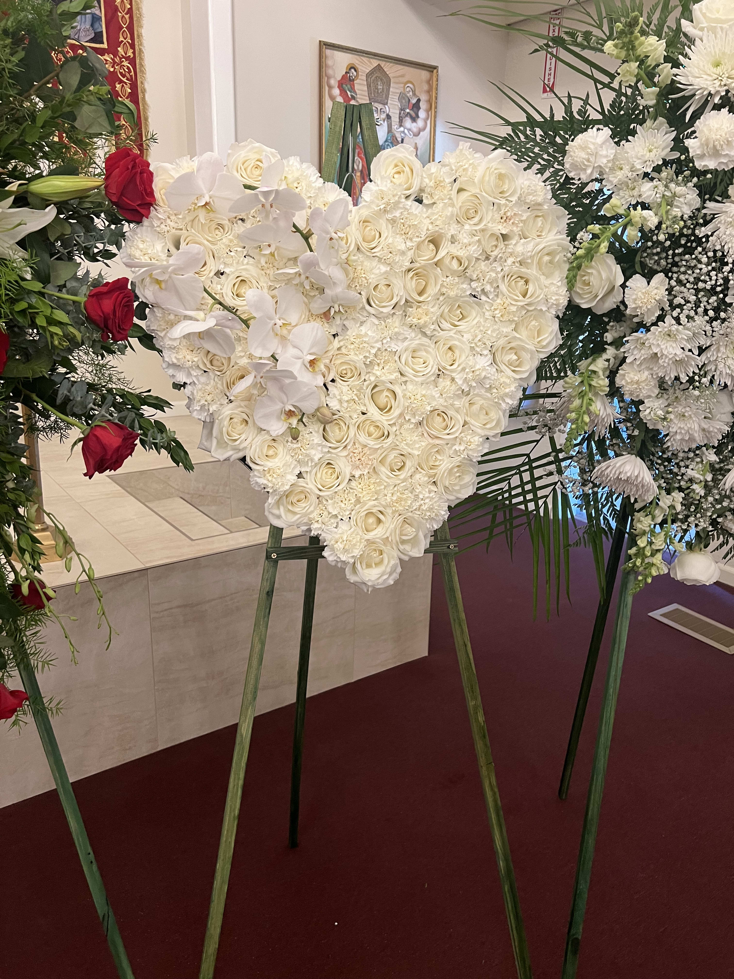 Heart with Orchid - Heart arrangement with roses mixed with carnations and orchid added 