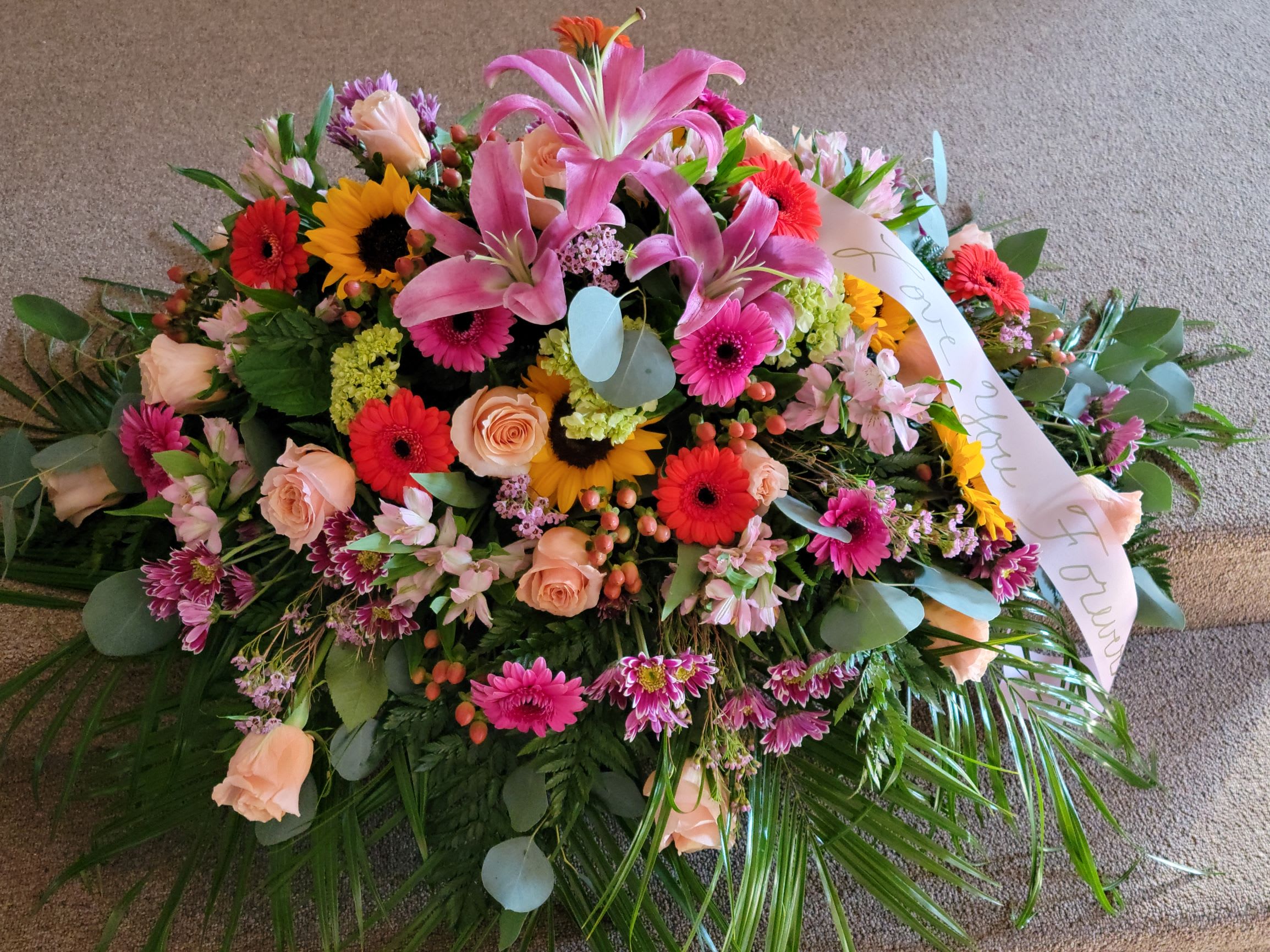 Large mixed flower spray with pink lilies and gerbera daisies