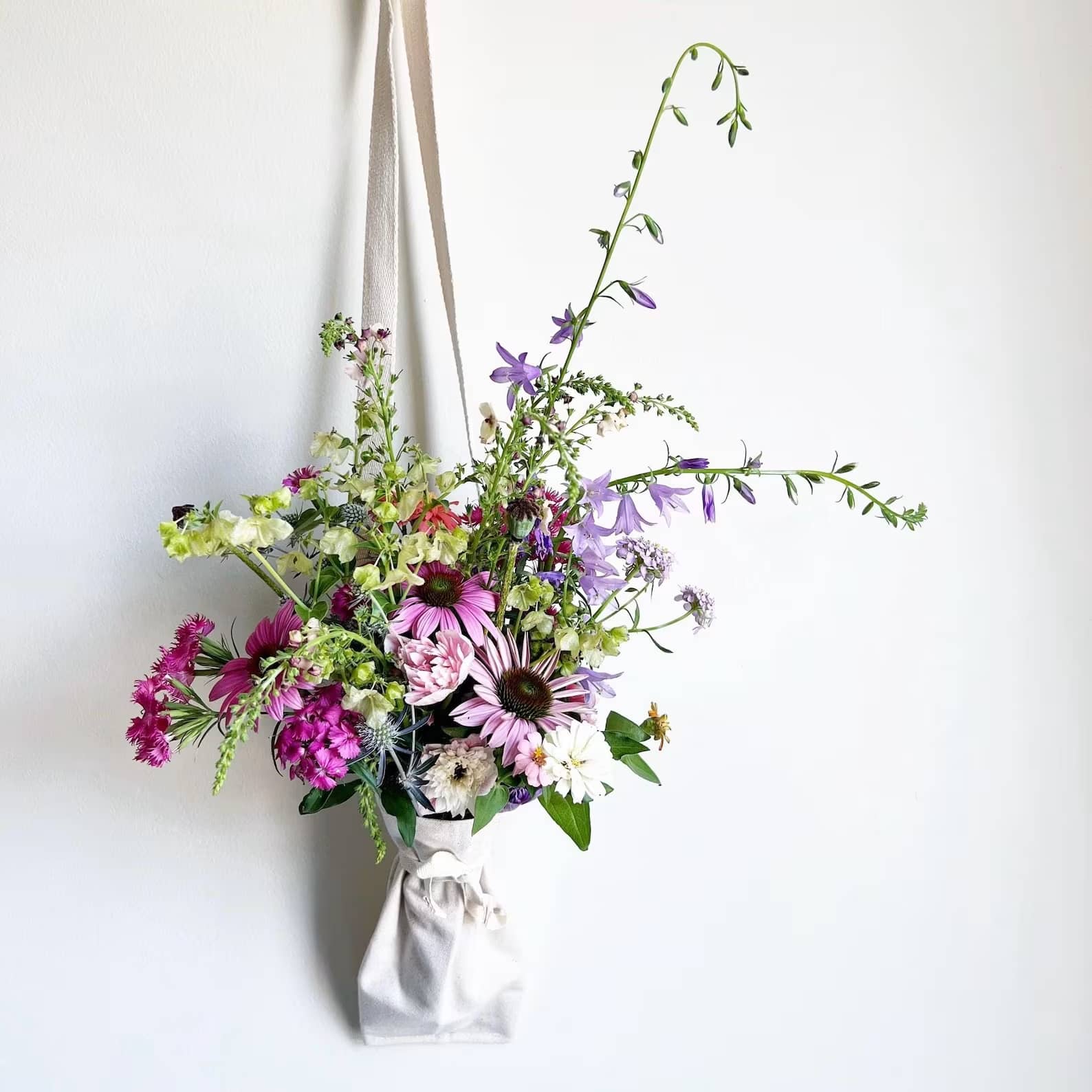 Mini Flower Tote and Flowers  - Grab your tote and head to the Flowerland! Makes for the perfect gift that will leave a lasting impression when picking flowers. Mini Tote in Natural Canvas includes Colorful Wildflower style bouquet. Trust us this is REALLY CUTE =) 