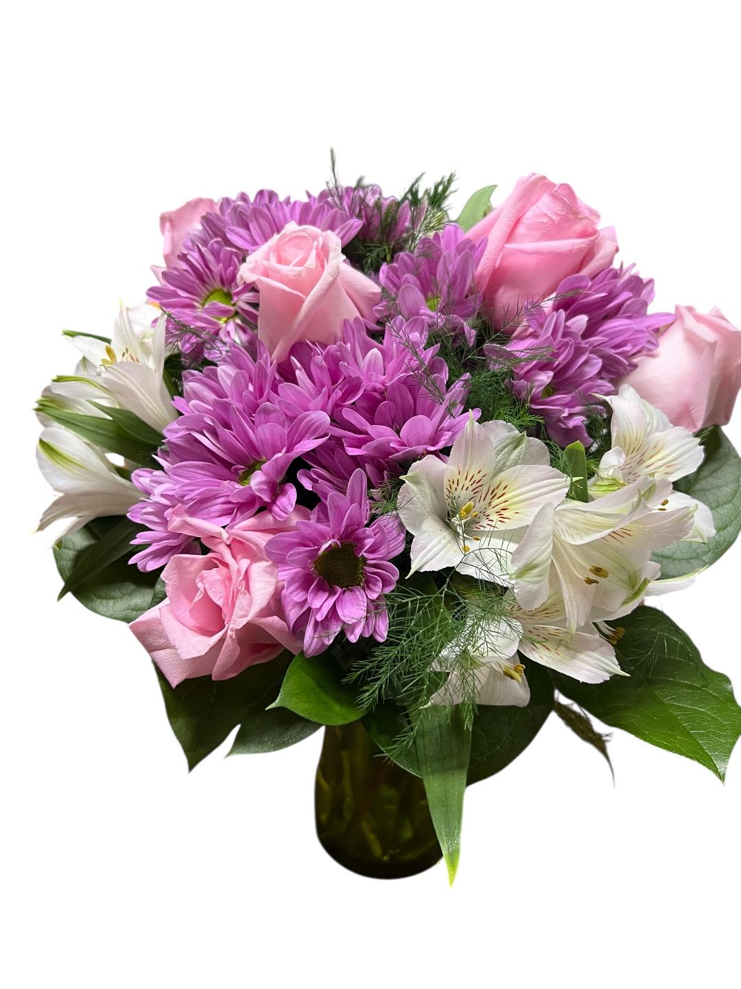 Pink roses and purple daisies arranged in a glass vase with white alstroemeria