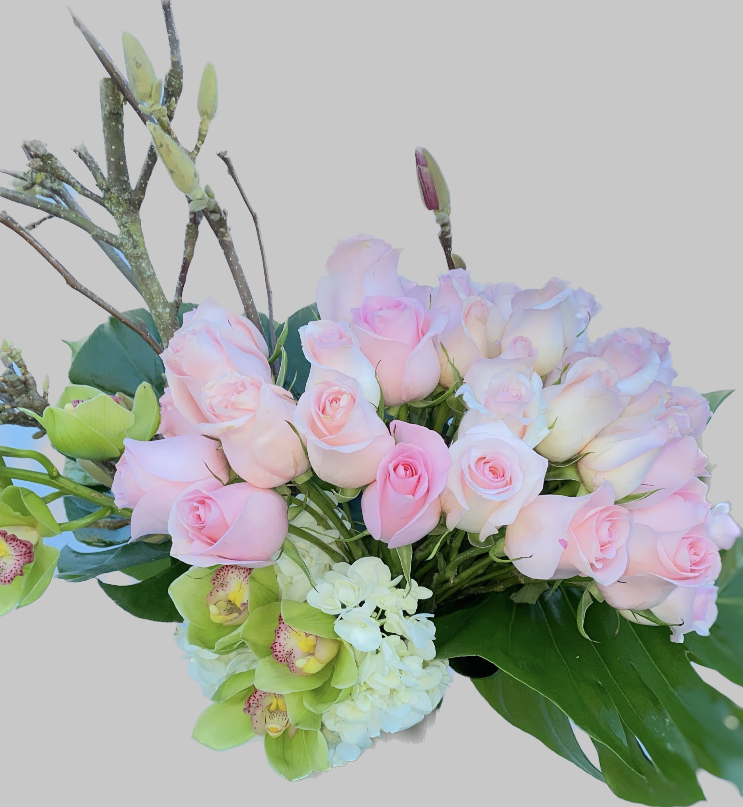 Bouquet of pale pink roses with green orchids and white hydrangea