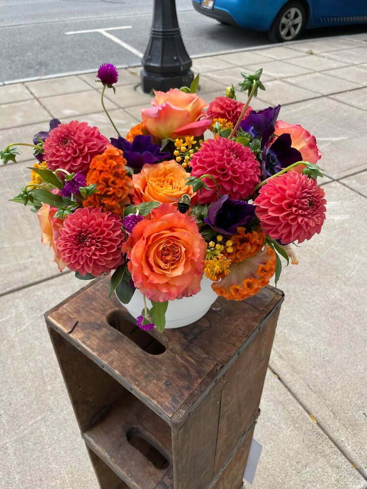 Syracuse Summer Sunset - Beautiful mix of fresh blooms arranged in a vase or container. All of our arrangements are 100% original, customizable and made-to-order.
