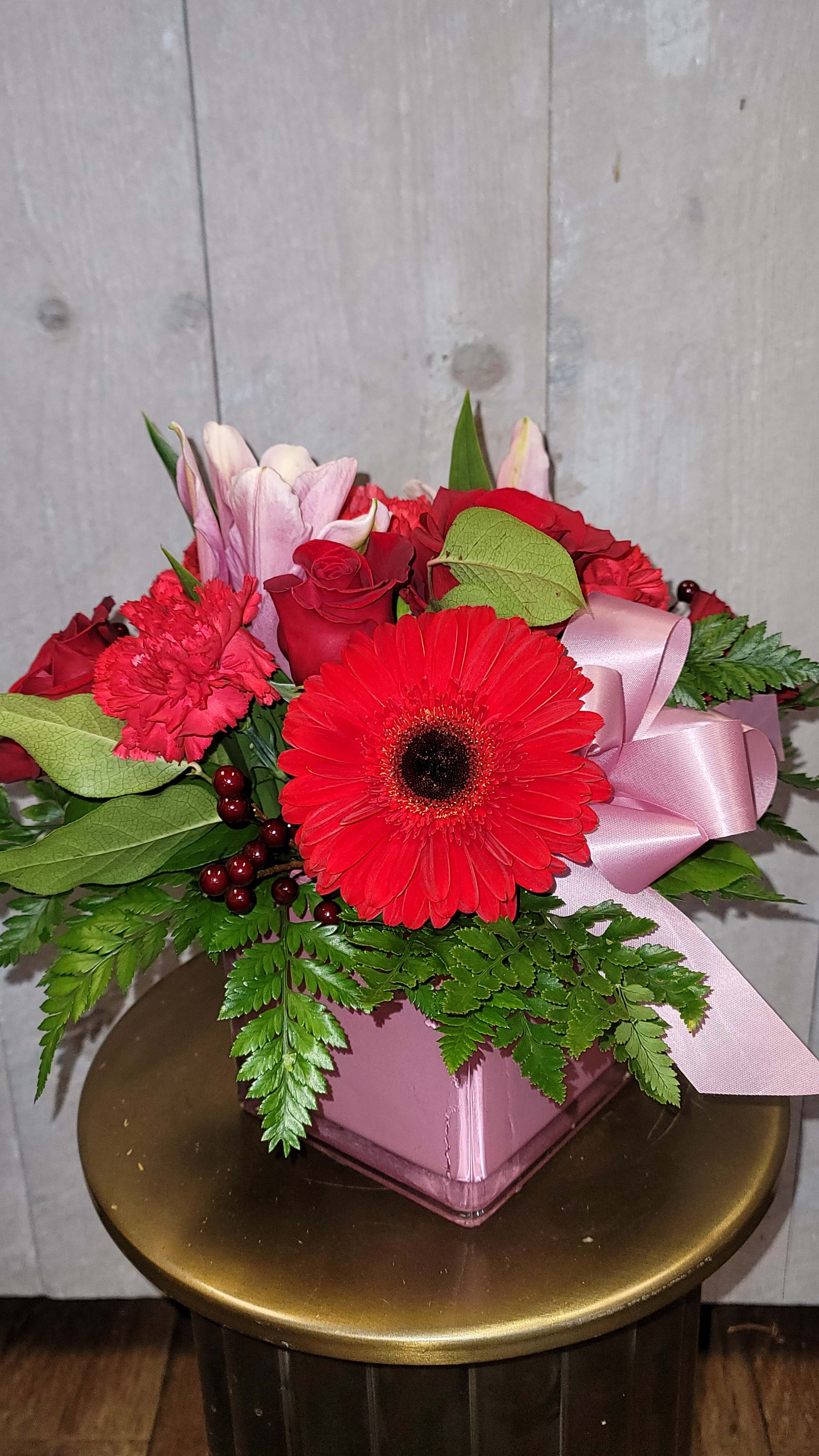 Love lust - Roses, Oriental lilies, Gerber Daisy, and Carnations in a square vase