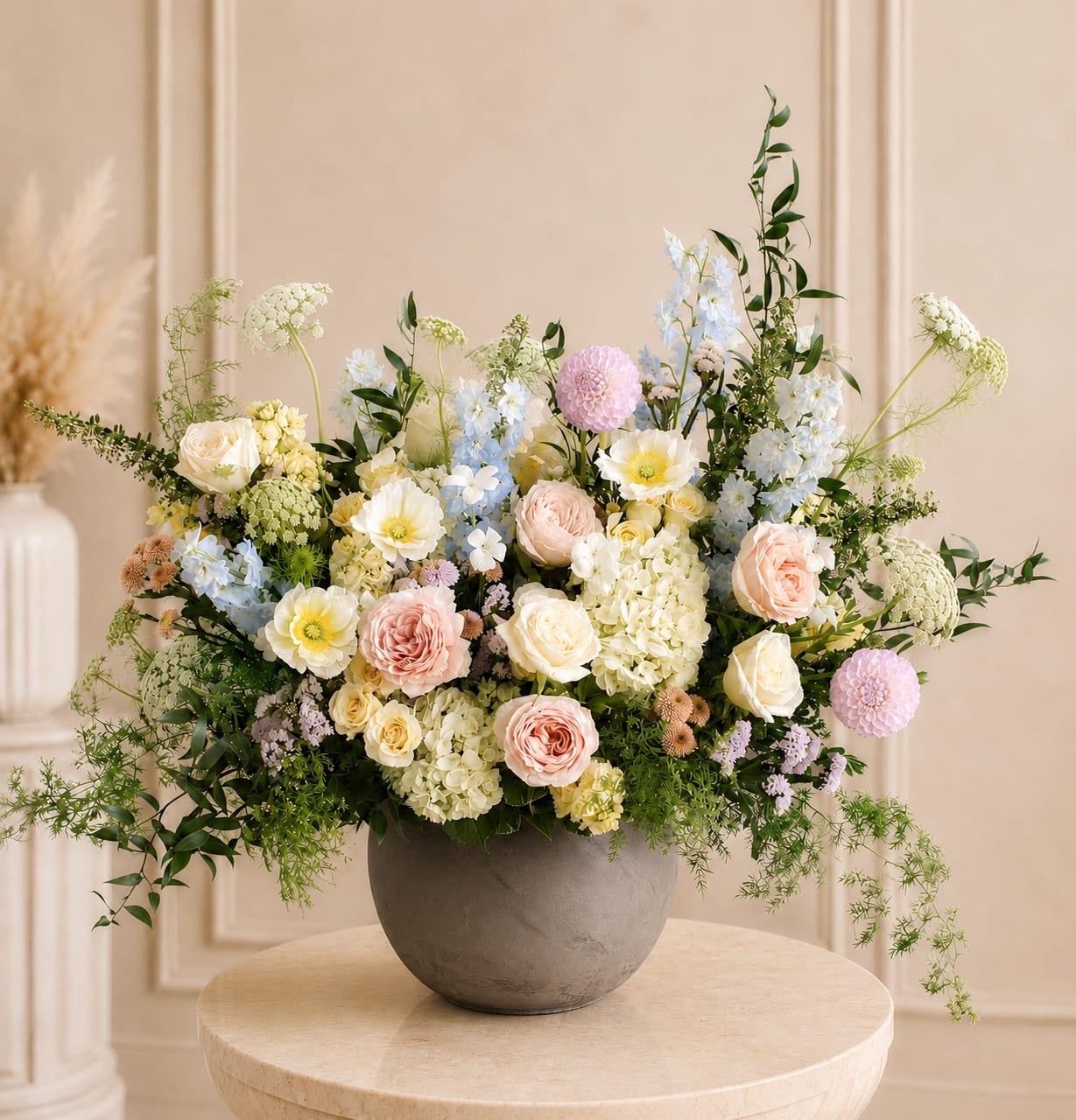 Royal Garden - This luxurious bouquet captures the essence of a serene garden, featuring an exquisite selection of pastel flowers that embody elegance and sophistication.  Our arrangement includes a harmonious blend of delicate and fragrant roses, and lush hydrangeas, all in soft, soothing shades. Accented with verdant greenery, each bloom is meticulously arranged to create a breathtaking display that will transform any setting into a picturesque garden oasis.  Ideal for a grande gesture, this Seasonal floral masterpiece promises to leave a lasting impression.  Experience the luxury of a Royal garden, beautifully handcrafted crafted locally by our skilled florist.