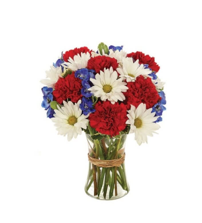 American Glory Bouquet  - Displaying a glorious celebration of red, white and blue  this assortment of Carnations, daisies and delphinium in Clear Vase 