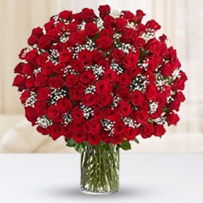 FULL OF LOVE 8 DOZEN  - 8 Dozen Red Roses on a Clear Vase