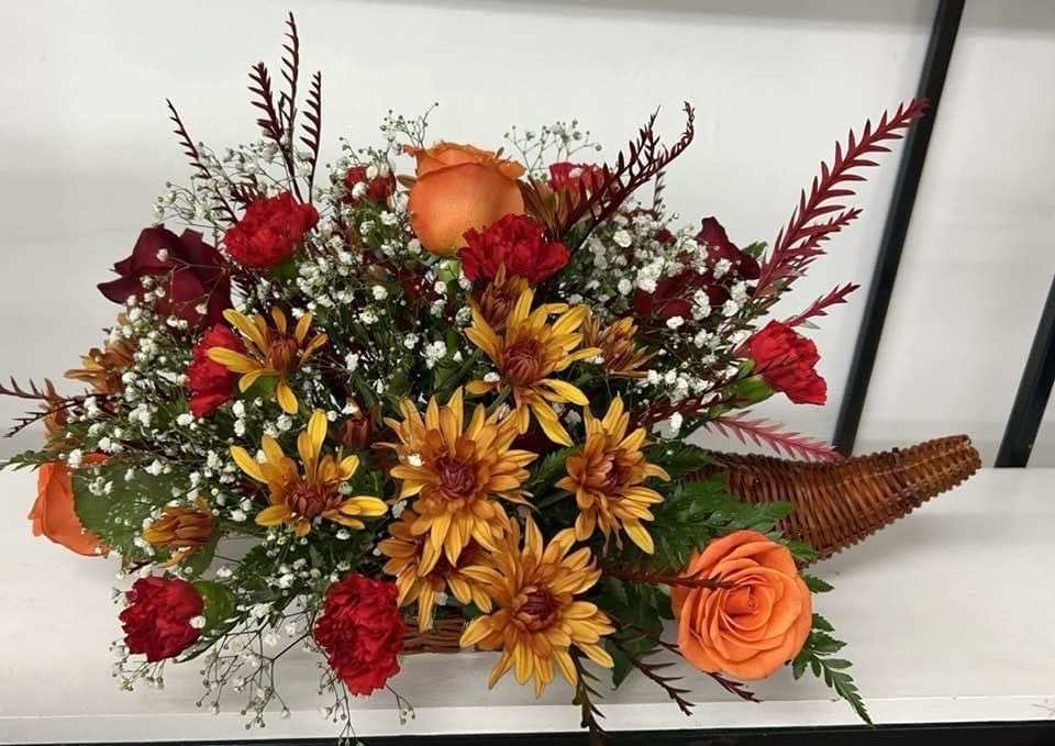 thankful love  - red roses,orange roses,yellow`brown margaritas ,red carnations, greenery,filling , super cute cornucopia basket 