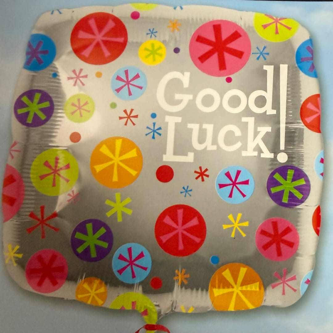 Silver balloon with colorful dots and the words Good Luck!