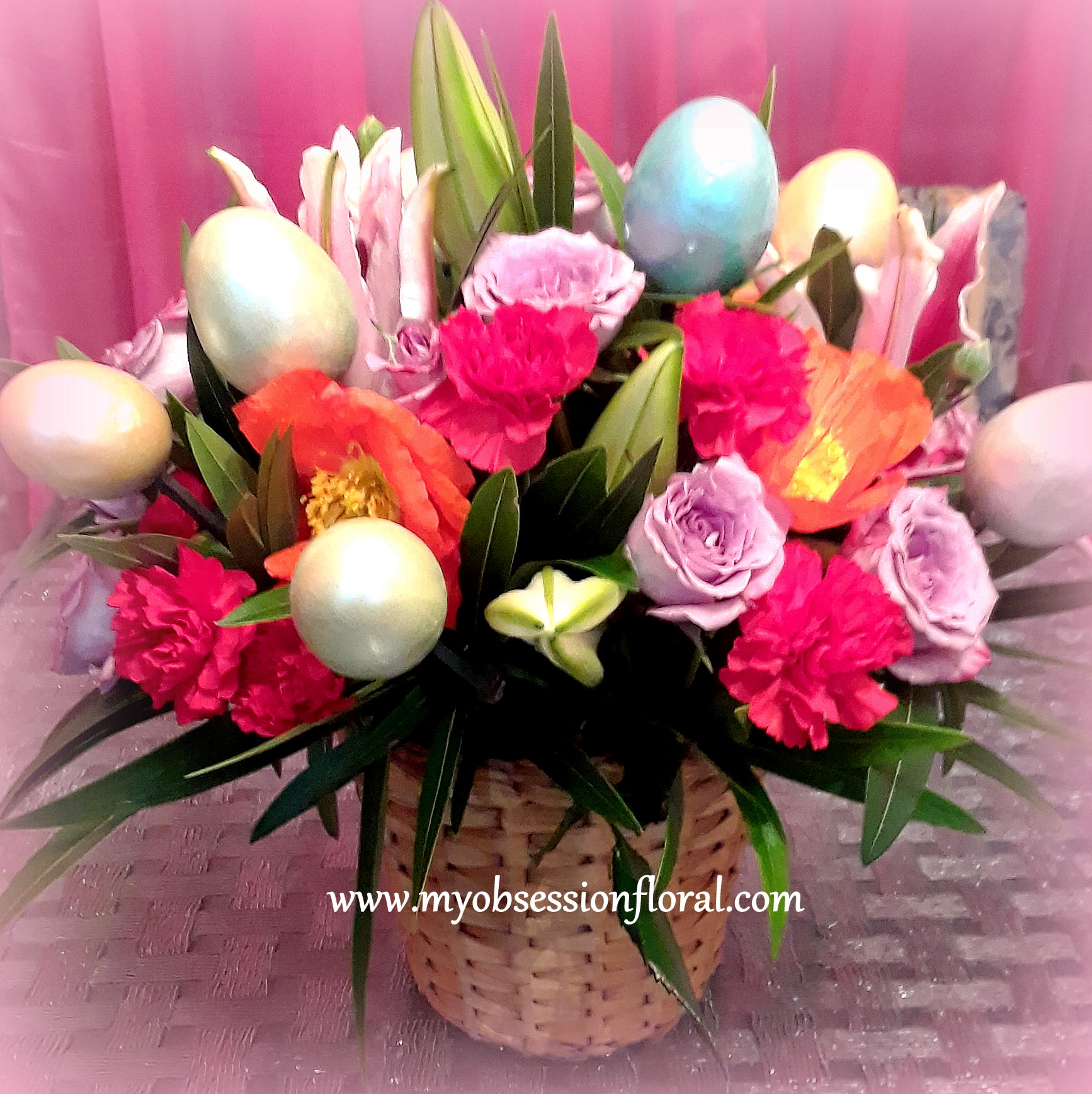 Eggstravaganza by My Obsession - Order this basket arrangement for Easter, to celebrate resurrection and the life eternal. Good for indoor or outdoor party or just as a thoughtful gift.