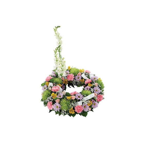 Circular floral wreath with a tall white flower spray and pastel blooms