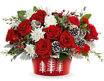 Red roses and white flowers in a red holiday container