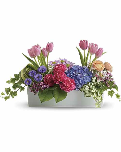 Garden Party Centerpiece - Whether you're hosting your own backyard picnic, or want to send some of your favorite spring flowers to someone special, this sweet centerpiece in the bright, beautiful English garden hues is great for any gatherings.