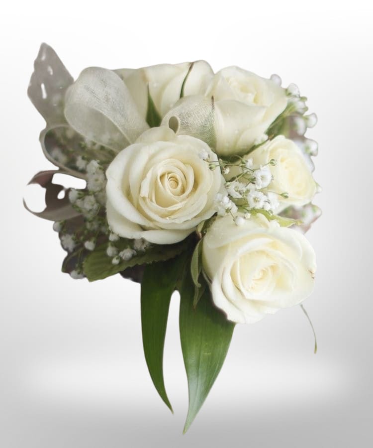 White rose bouquet with baby's breath and green leaves