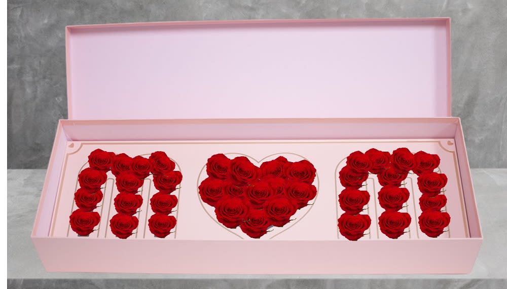 Pink gift box with red roses arranged in the letters M and N and a heart