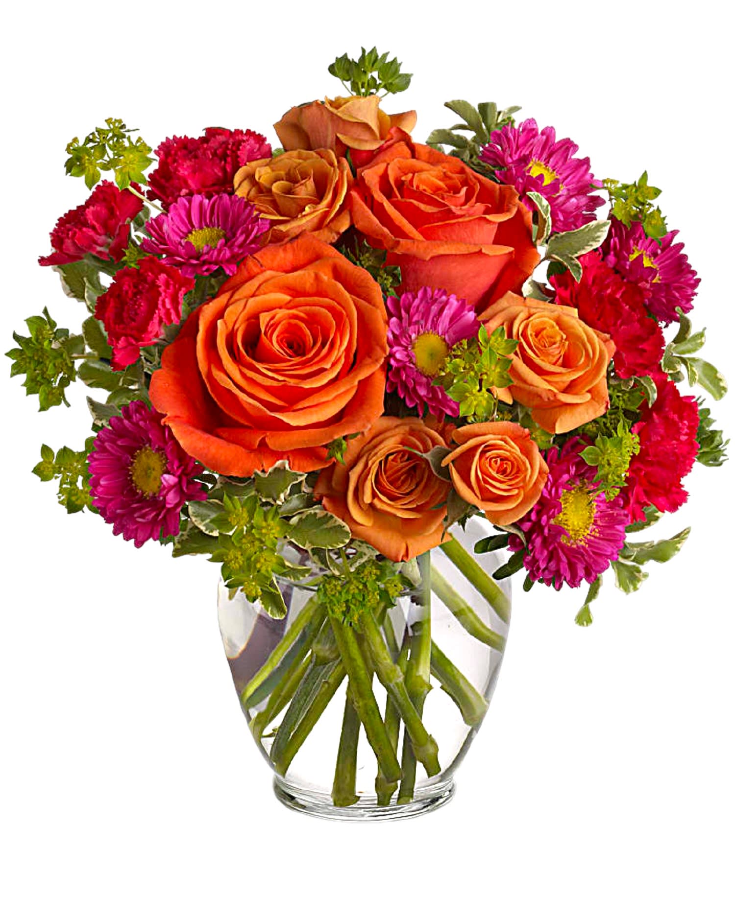 Orange roses and pink daisies in a clear glass vase