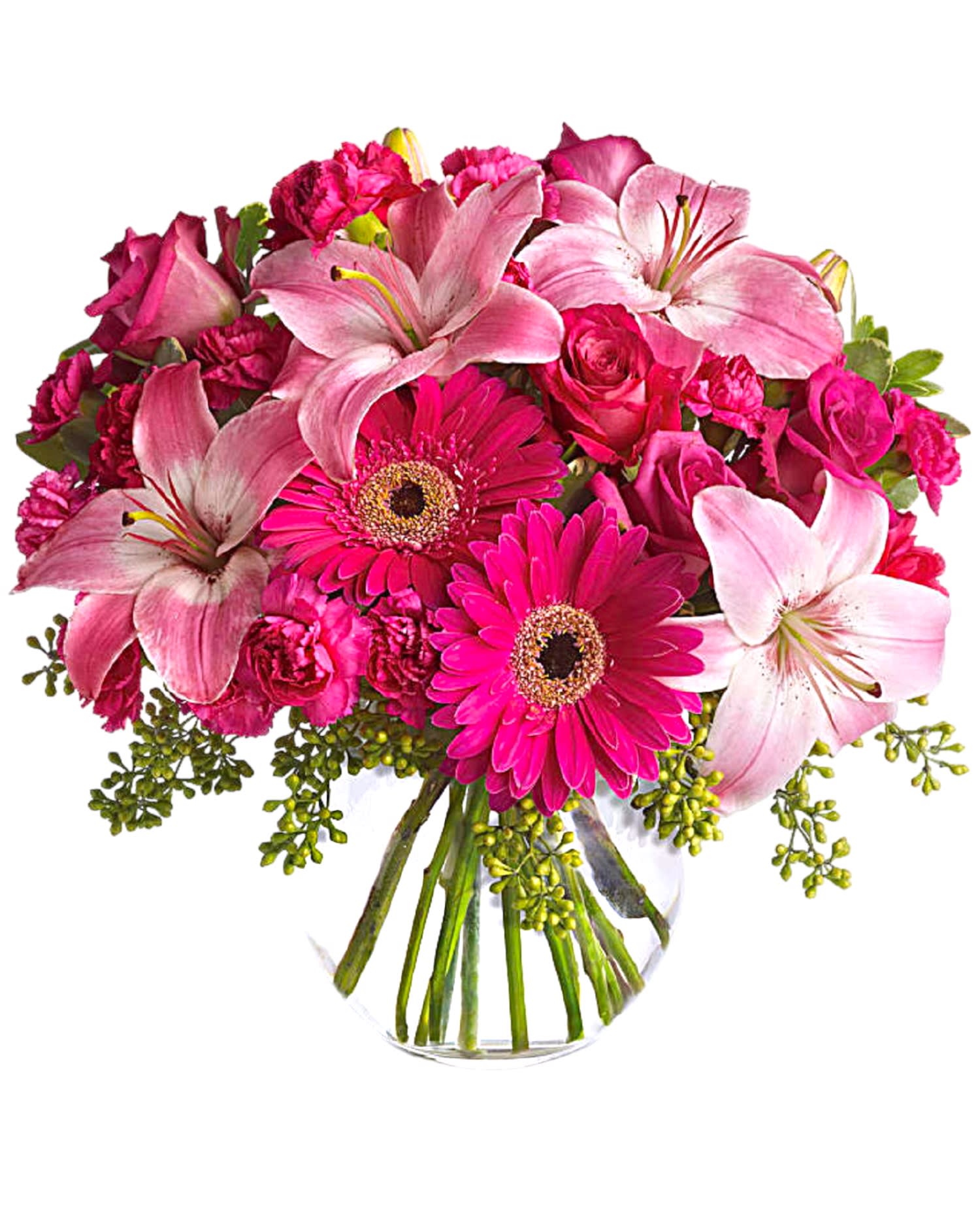 Pink lilies, roses, and gerbera daisies in a clear glass vase