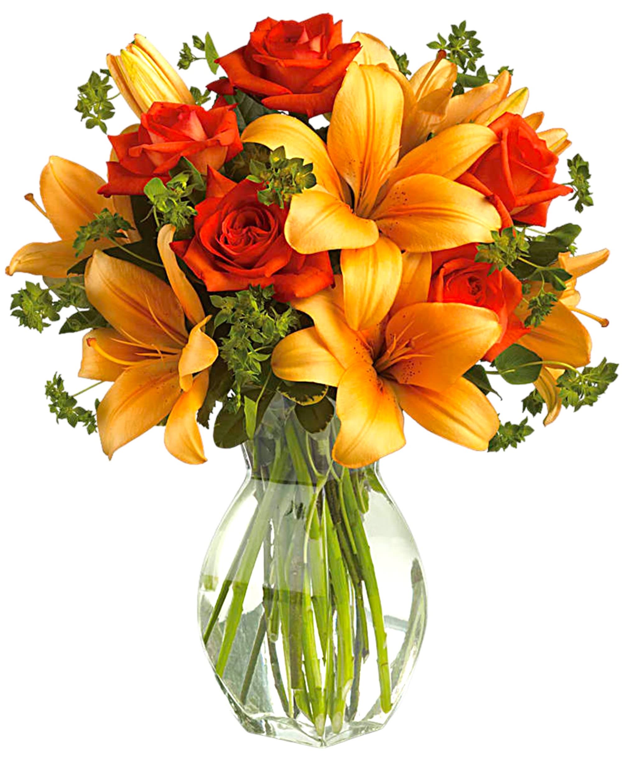 Orange lilies and red roses in a clear glass vase