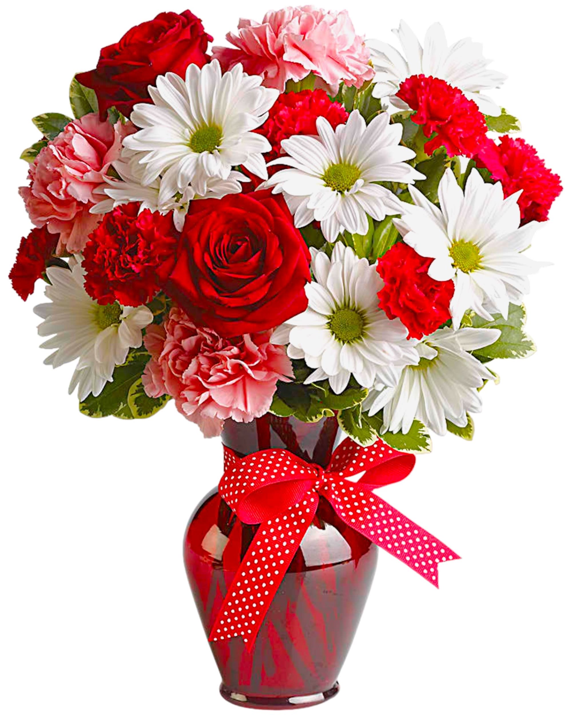 Bouquet of red roses, white daisies, and pink carnations in a red vase with a ribbon