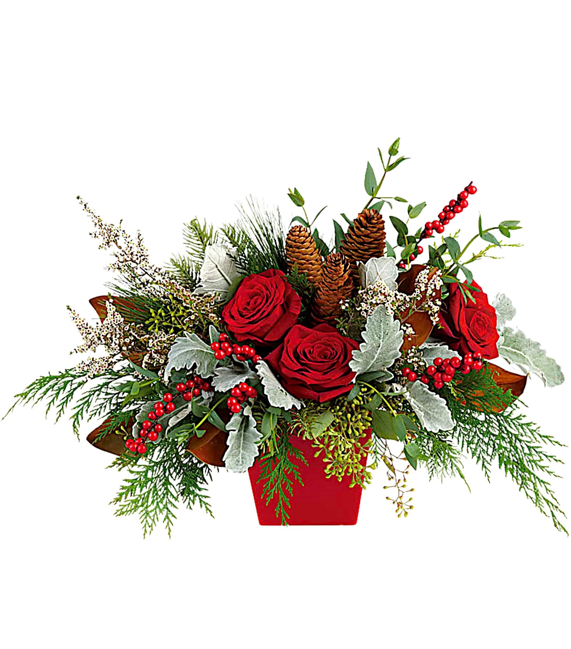 Red roses in a red container with pinecones and berries