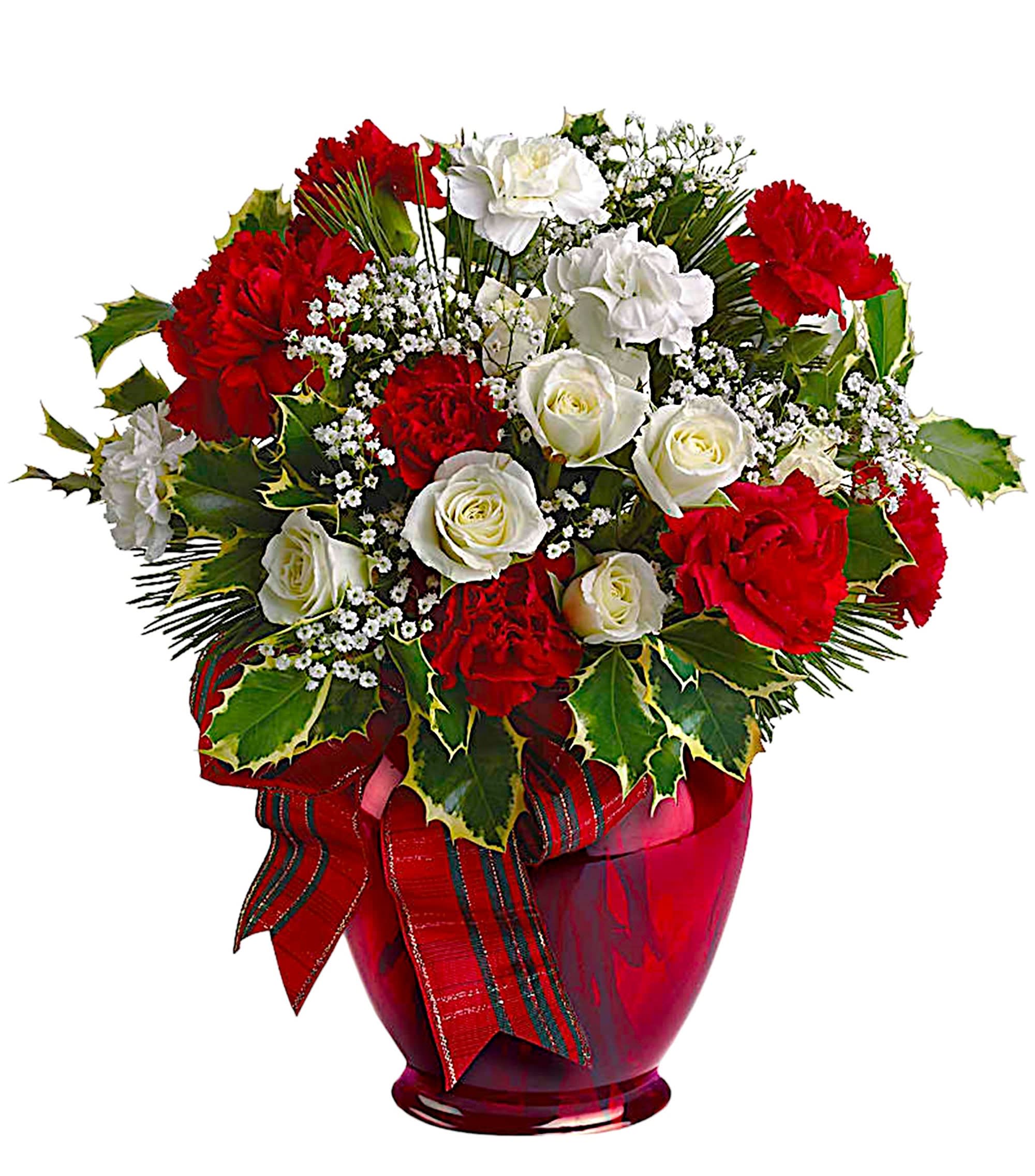 Red and white roses in a red glass vase with a ribbon