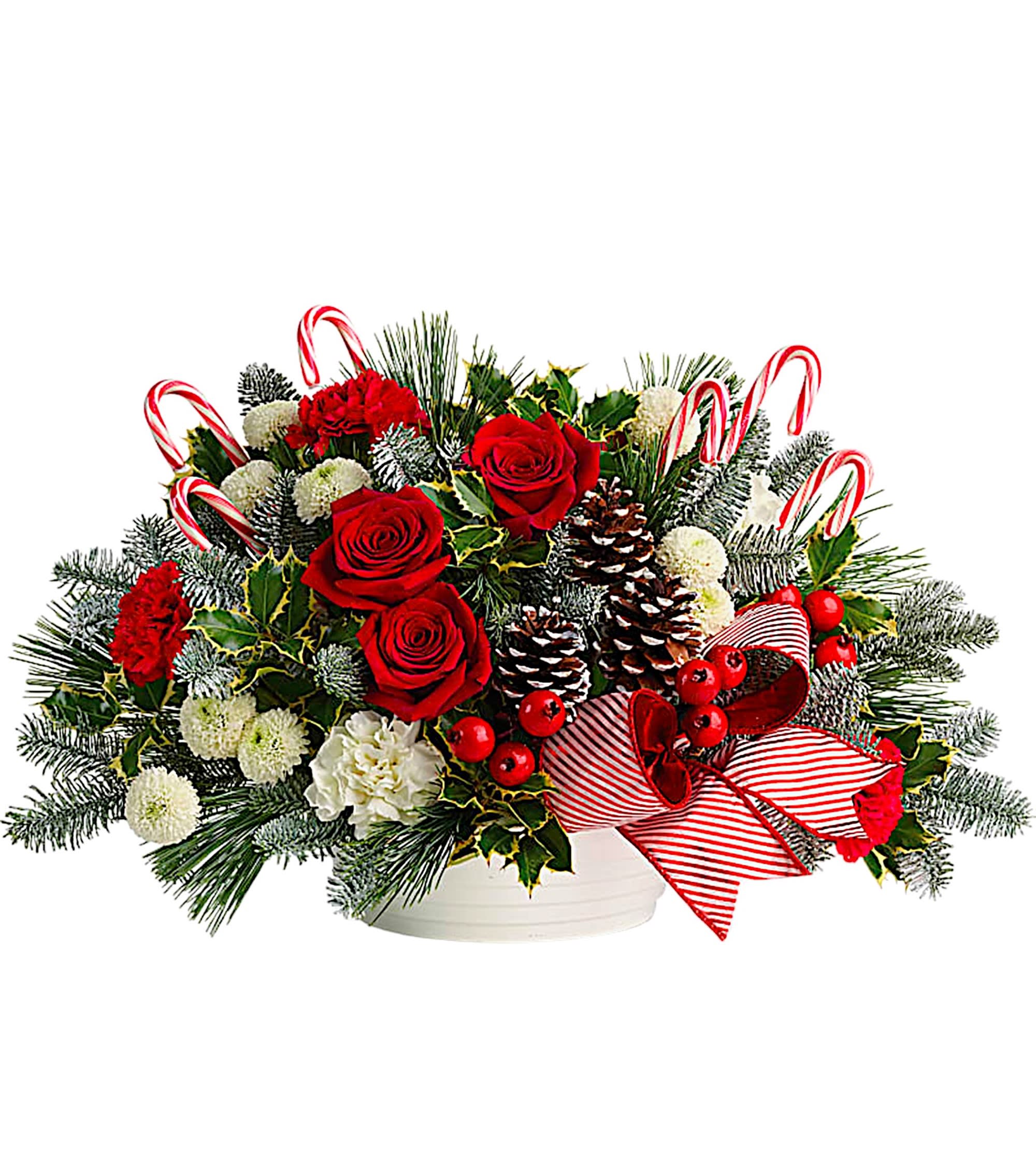 Christmas bouquet with red roses, carnations, pinecones, and candy canes in a white container