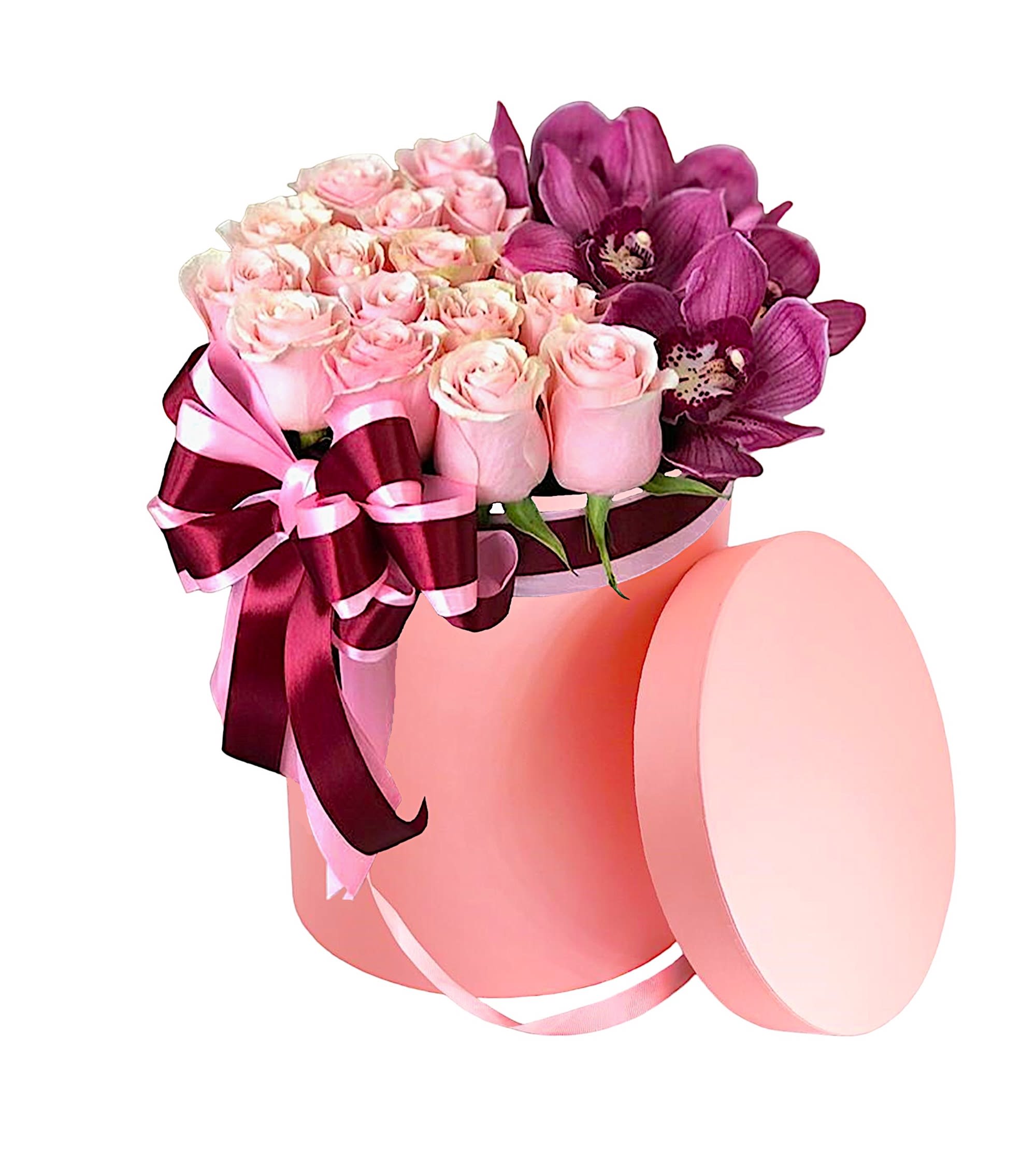 Pink roses and purple orchids in a round pink box with ribbon