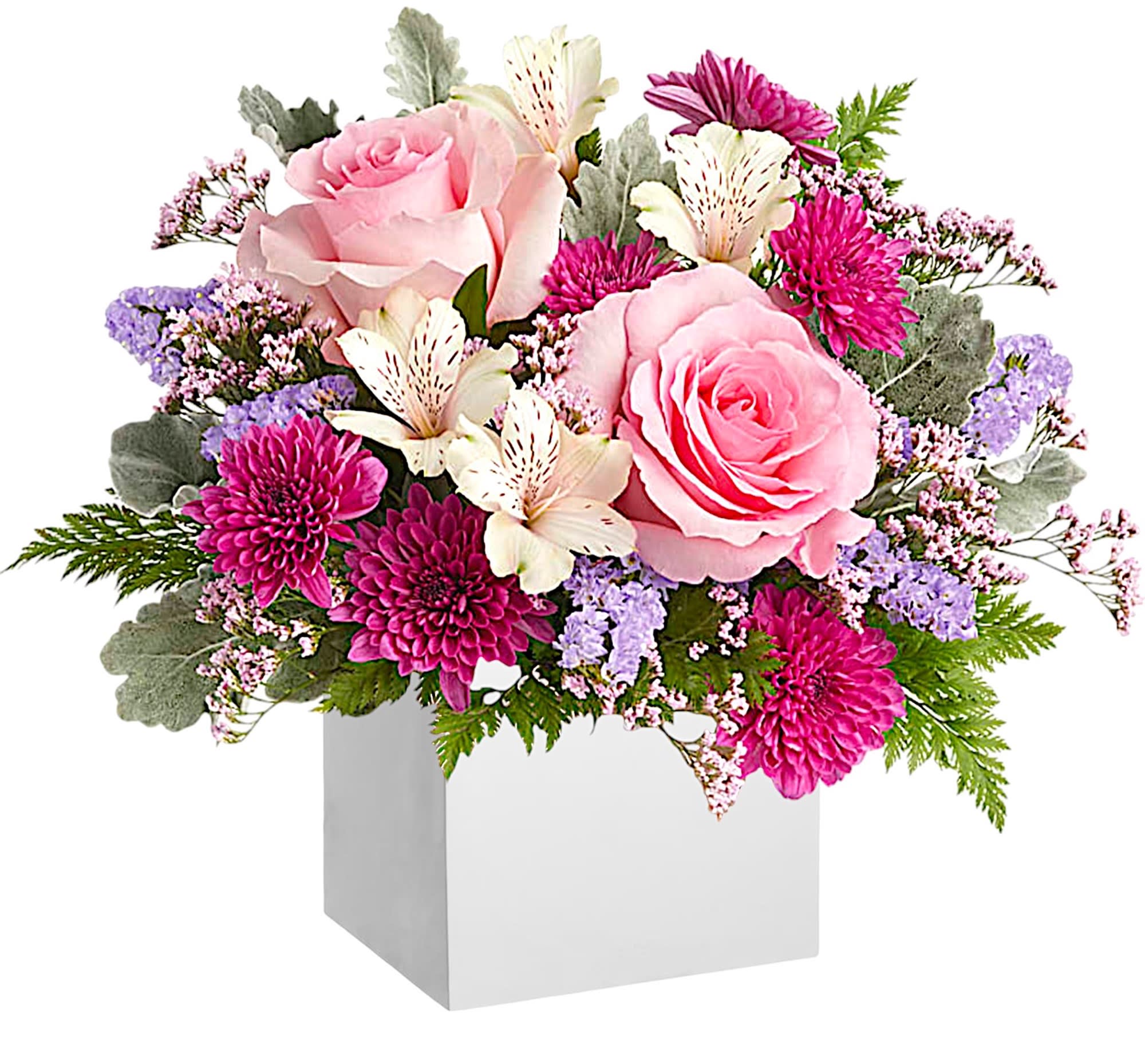 Pink roses and magenta mums in a white box vase