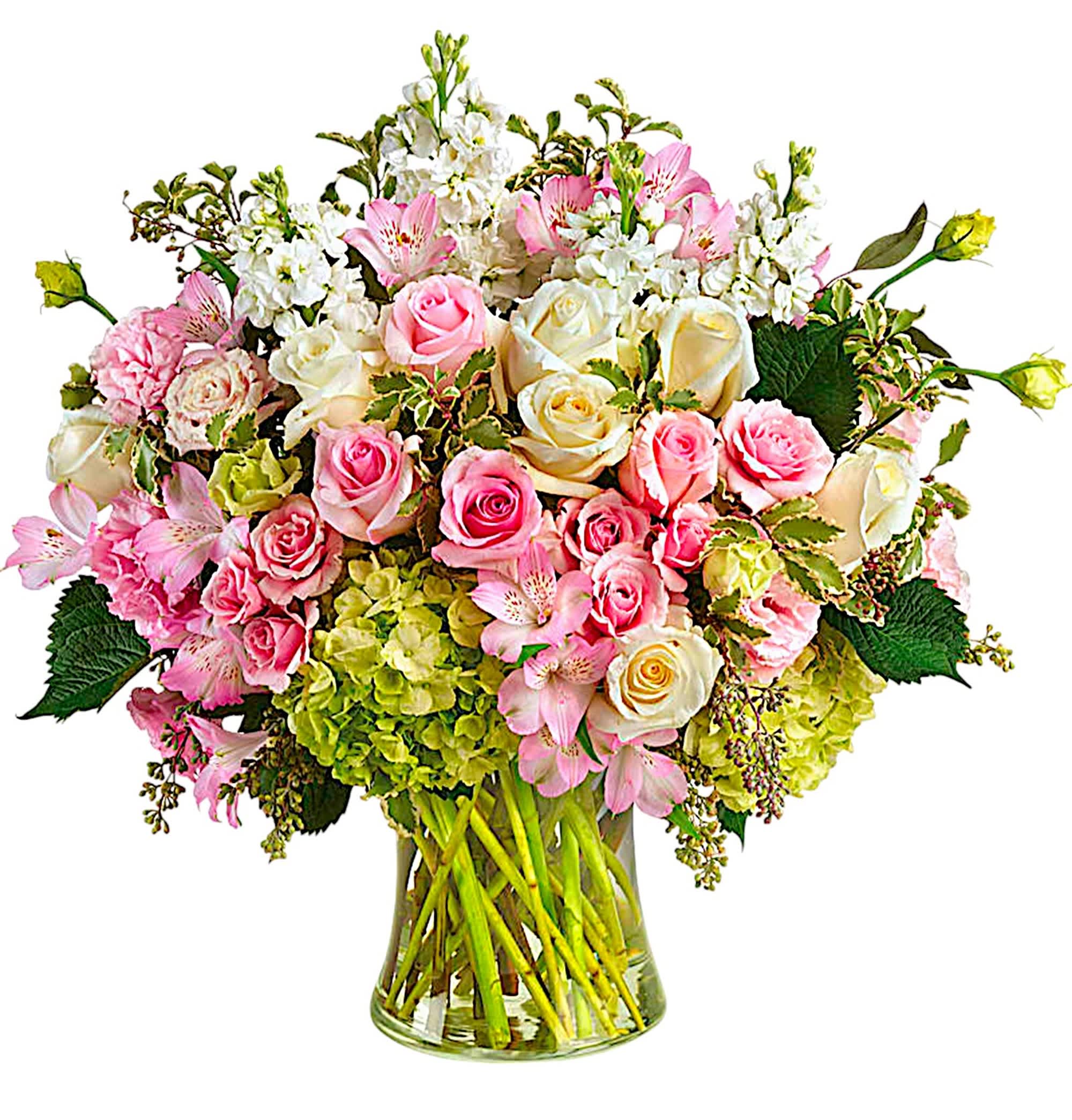 Pink and white roses with alstroemeria in a glass vase