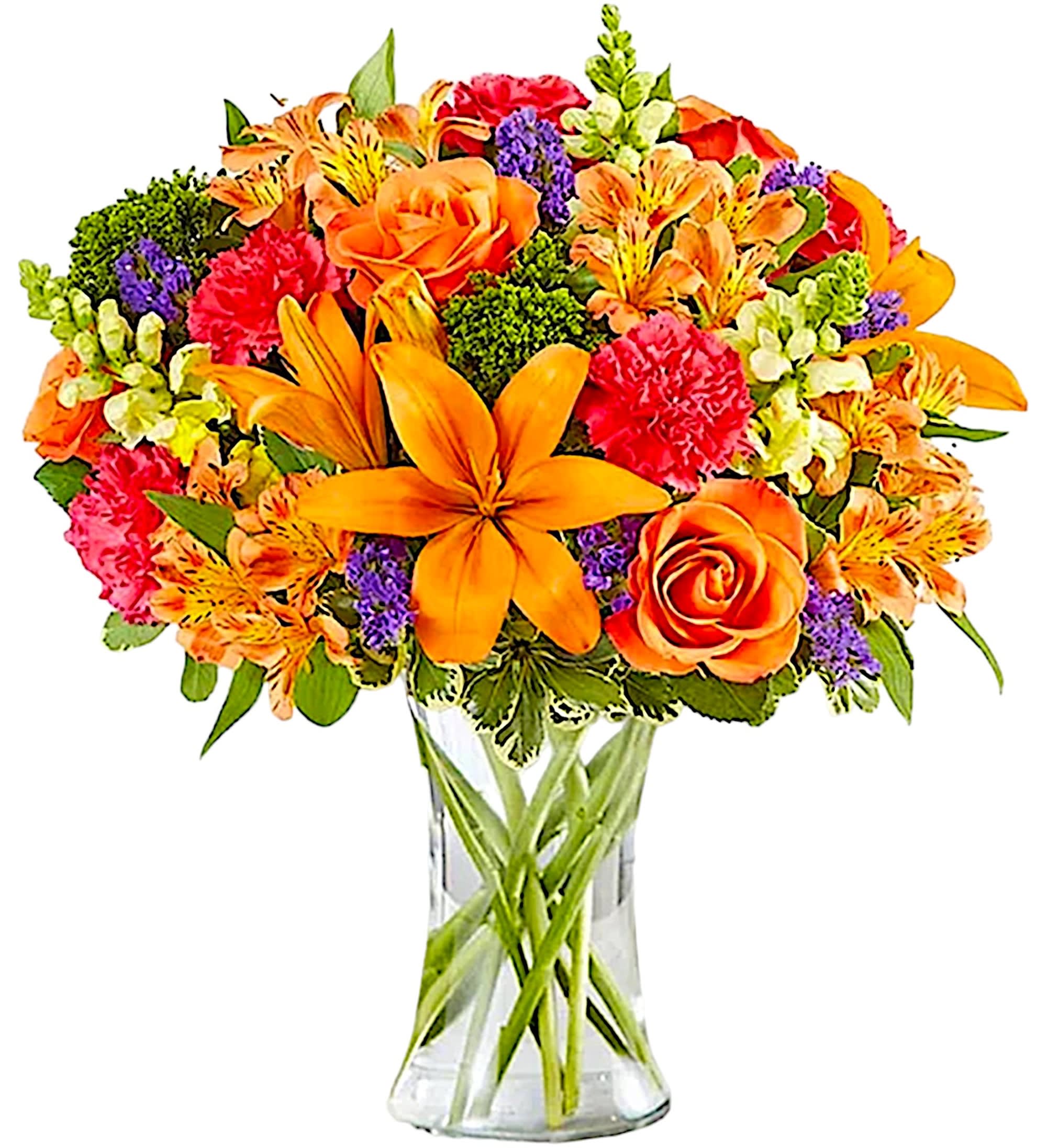 Bright mixed bouquet with orange lilies and roses in a clear glass vase