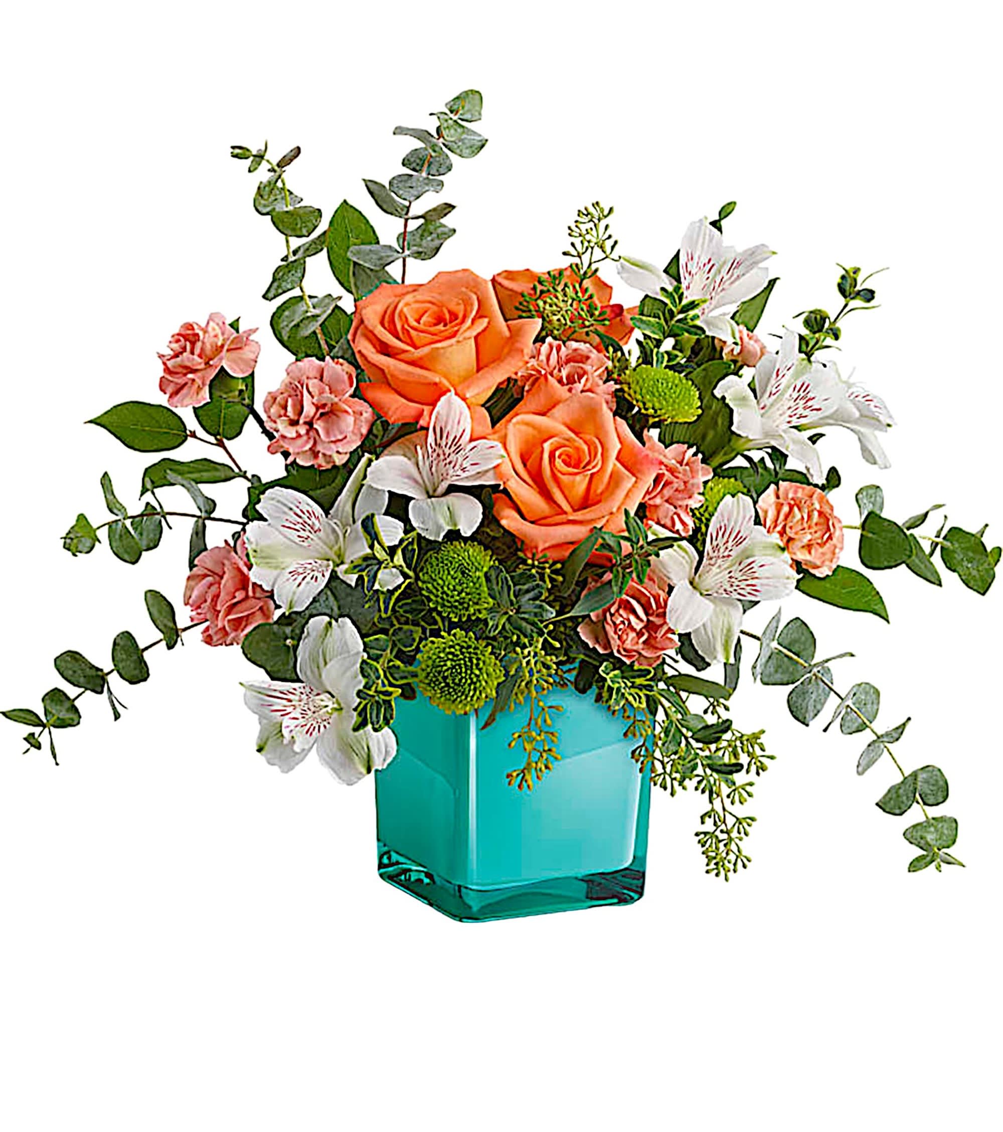 Orange roses and white lilies in a turquoise vase